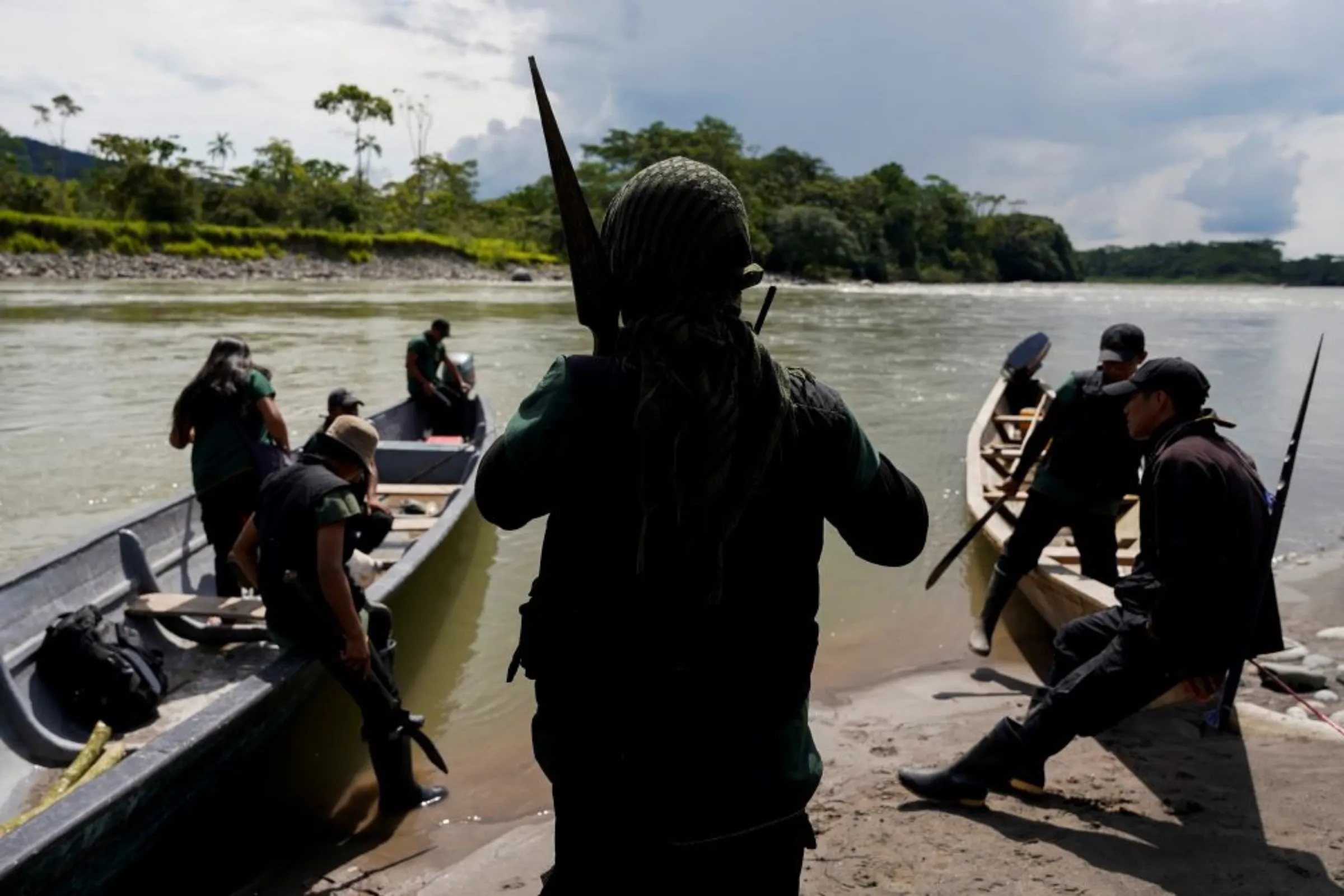 Members of the A'i Cofan community guard patrol the banks of the Aguarico River in Ecuador's Amazon, in Sinangoe, Ecuador March 5, 2022