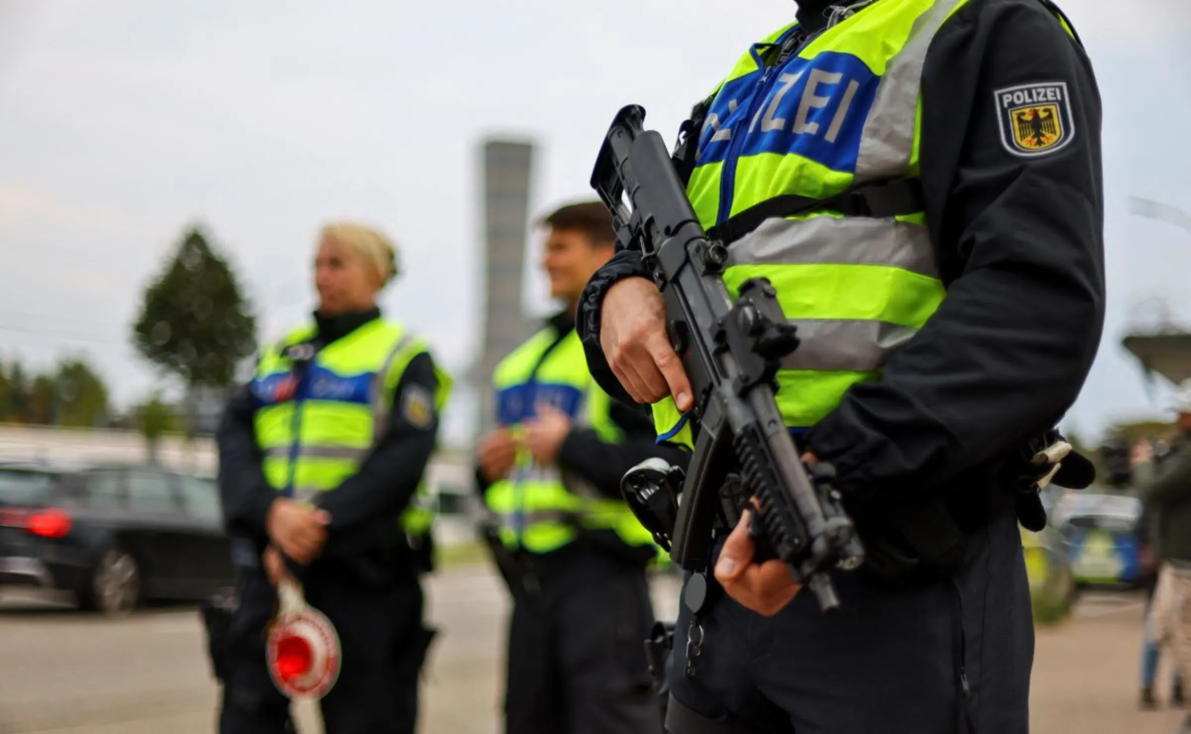 German police officers stand guard at a border with France, as all German land borders are subject to random controls to protect internal security and reduce irregular migration, in Kehl, Germany, September 16, 2024. REUTERS/Joachim Herrmann