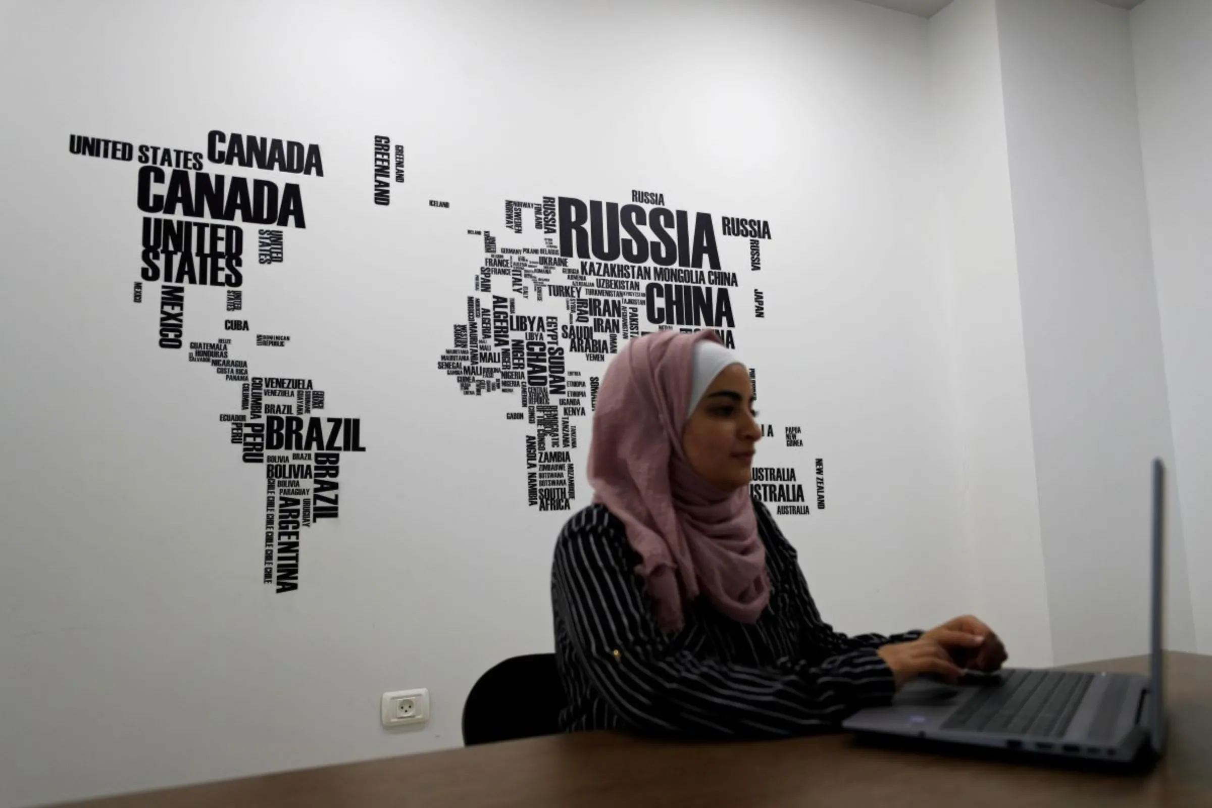 Palestinian engineer Sojoud Jebreel, 21, works at Doroob Technologies office in Ramallah, in the Israeli-occupied West Bank July 31, 2019. Picture taken July 31, 2019. REUTERS/Mohamad Torokman