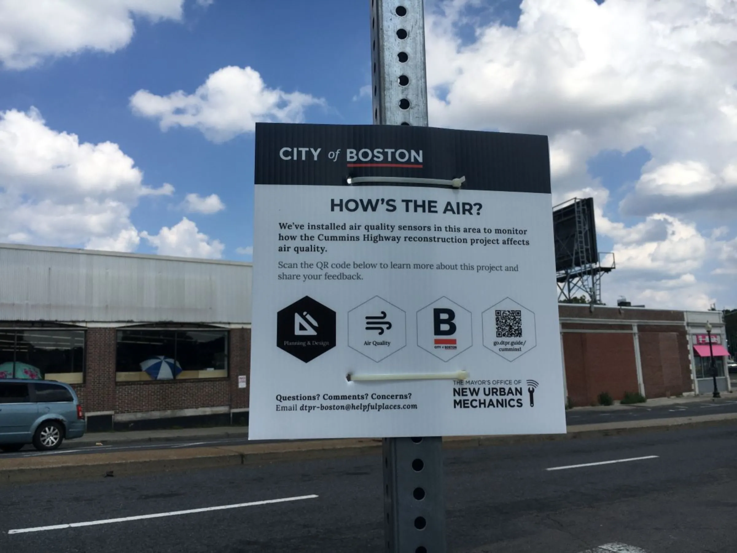 A sign in Boston alerts pedestrians to a nearby air quality sensor. Mayor's Office of New Urban Mechanics/Handout via Thomson Reuters Foundation