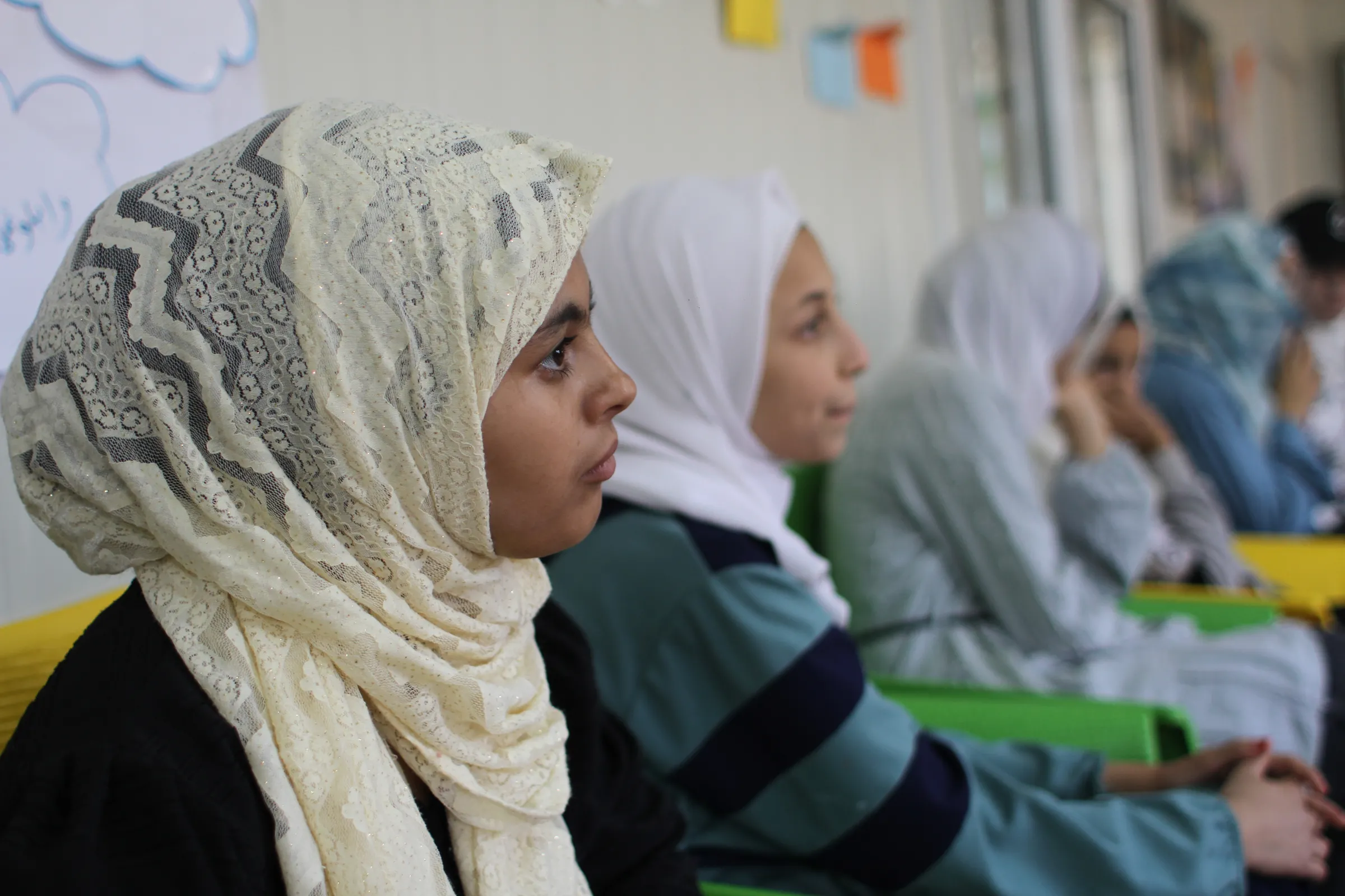 Syrian girls attend classes inside a youth centre at the Zaatari refugee camp near the border city of Mafraq, Jordan, 18 October 2022