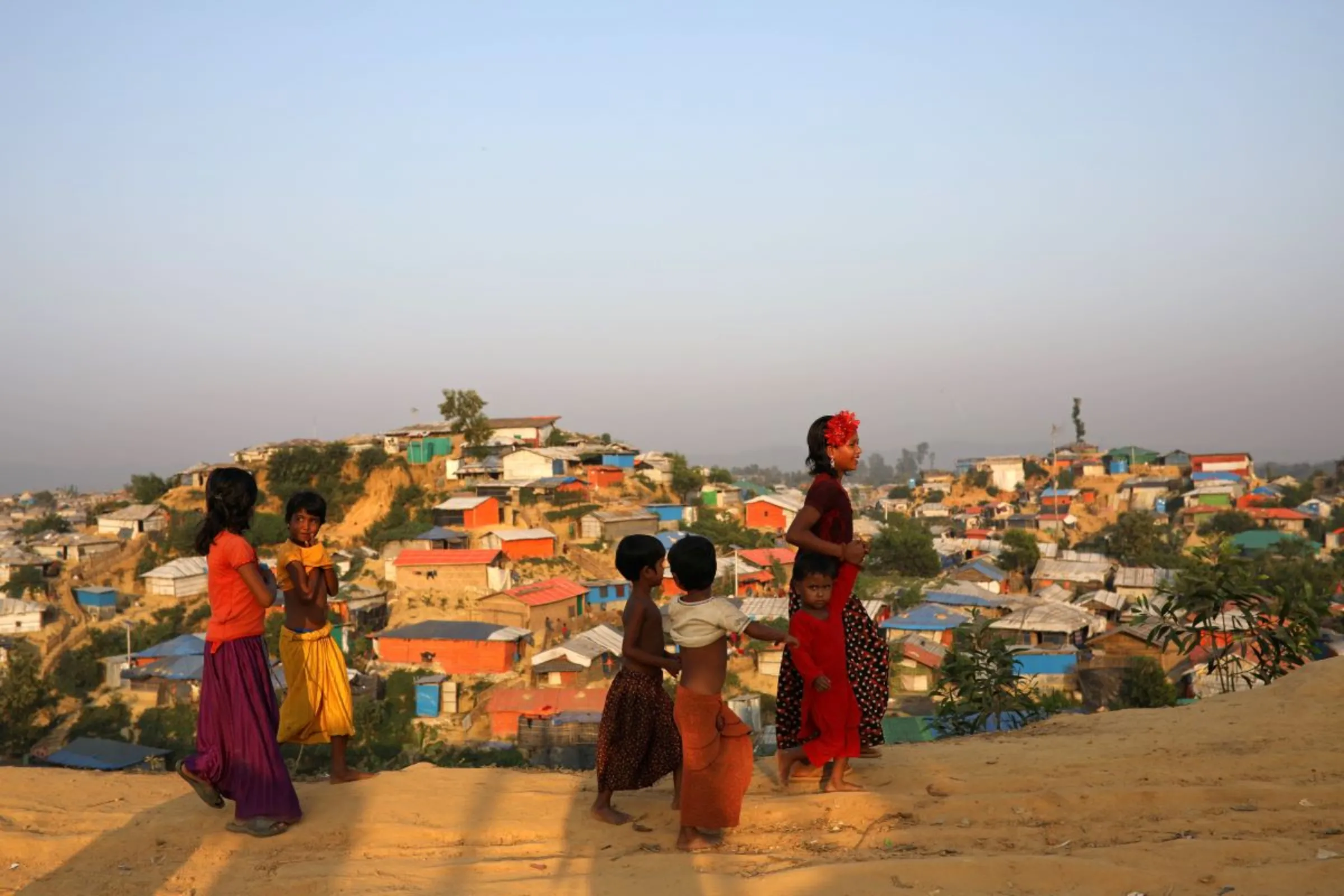 Rohingya refugee children walk along the road at Balukhali camp in Cox’s Bazar, Bangladesh, November 16, 2018