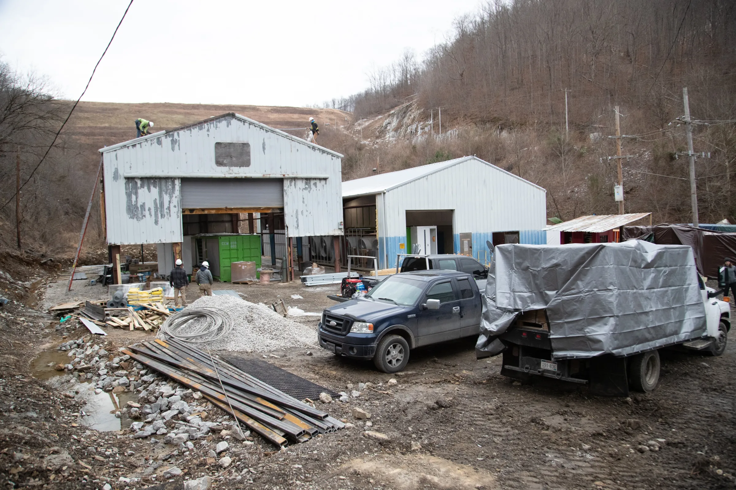 Construction workers at a Blockware Solutions operation on an old coal mining site in Belfry, Kentucky, January 24, 2022. Thomson Reuters Foundation/Amira Karaoud