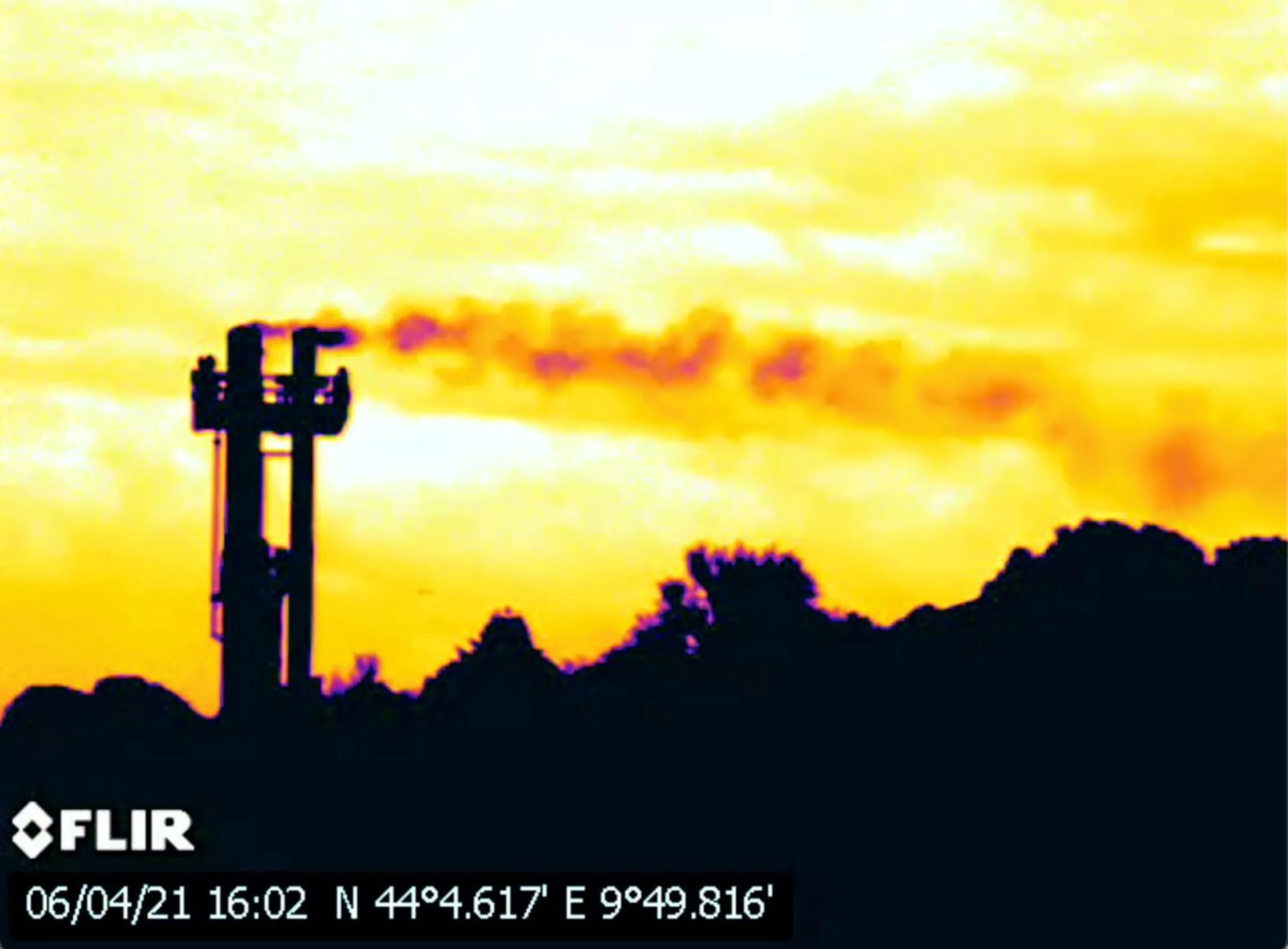 A handout screen grab from thermographic video footage shot on April 6 by Clean Air Task Force (CATF), shows what appears to be methane gas leaking from two stacks at SNAM's Panigaglia LNG terminal near La Spezia, Italy. CATF/James Turitto/Handout via Reuters