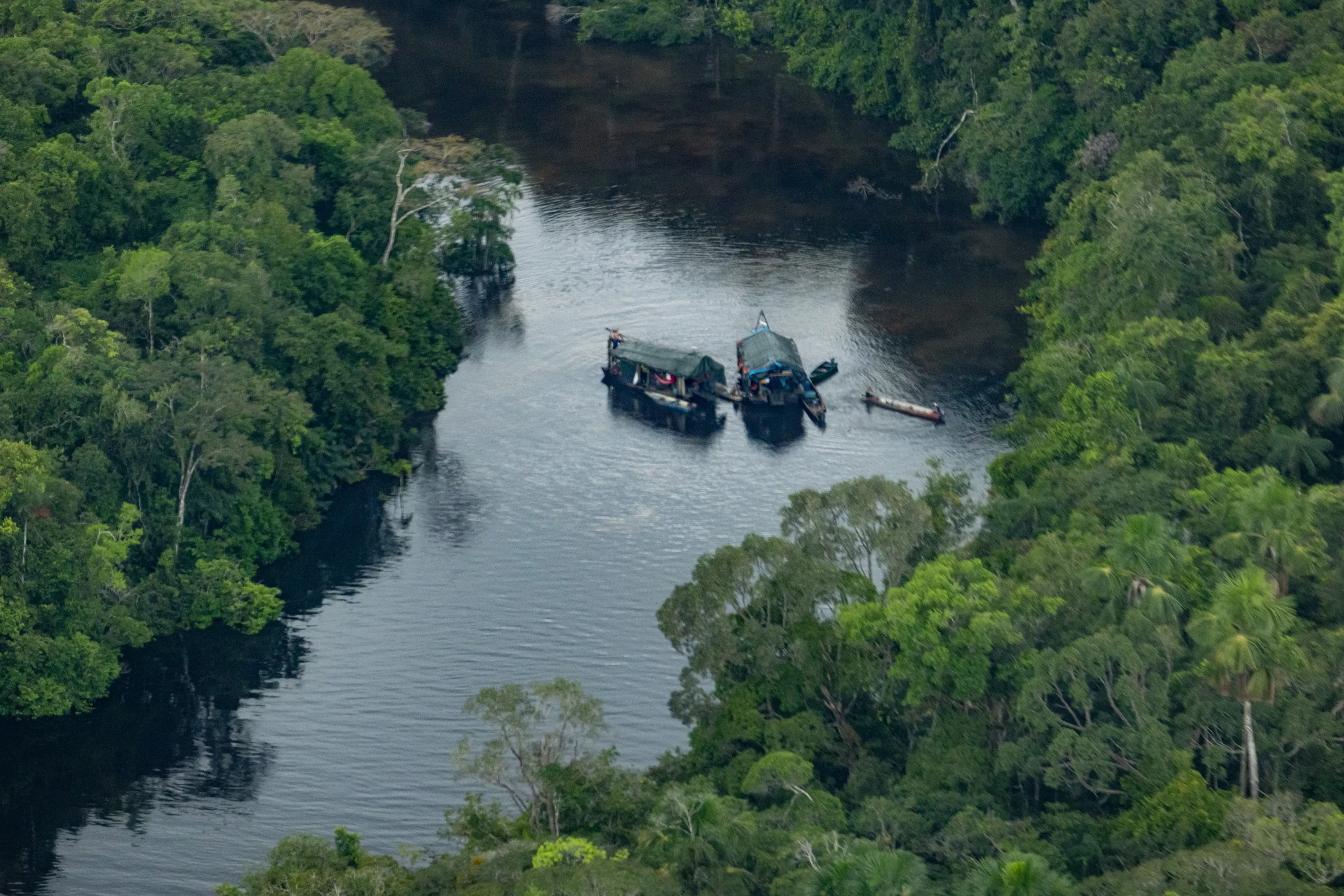 Dredgers used by illegal gold miners operate on the Nanay River in Loreto. Mining activity on bodies of water is expressly prohibited in Peru, June, 2023. FCDS Perú/Handout via Thomson Reuters Foundation