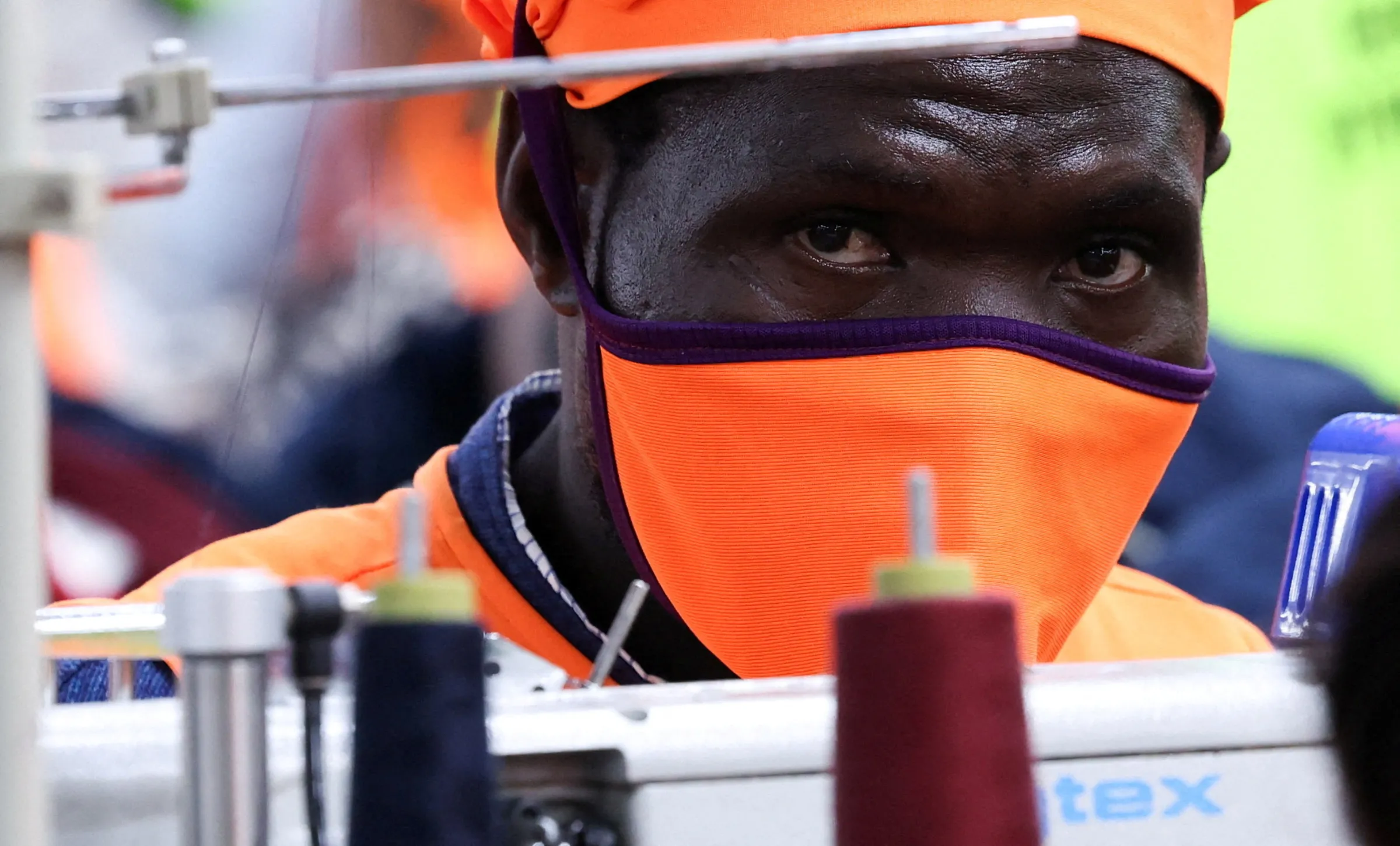 A Kenyan worker prepares clothes for export at the New Wide Garment Export Processing Zone (EPZ) factory operating under the U.S. African Growth and Opportunity Act (AGOA), in Kitengela, Kajiado County Kenya September 19, 2025. REUTERS/Monicah Mwangi
