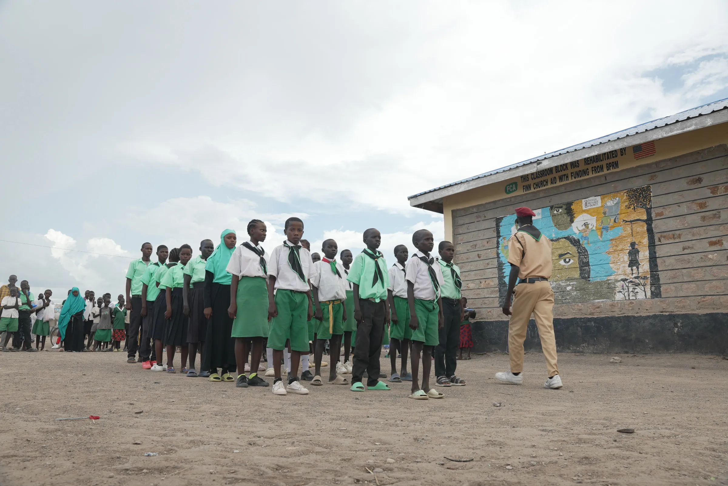 Scouts line up at the Future Primary School in the Kakuma Refugee Camp in northern Kenya, May 21, 2025. Thomson Reuters Foundation/Farai Shawn Matiashe