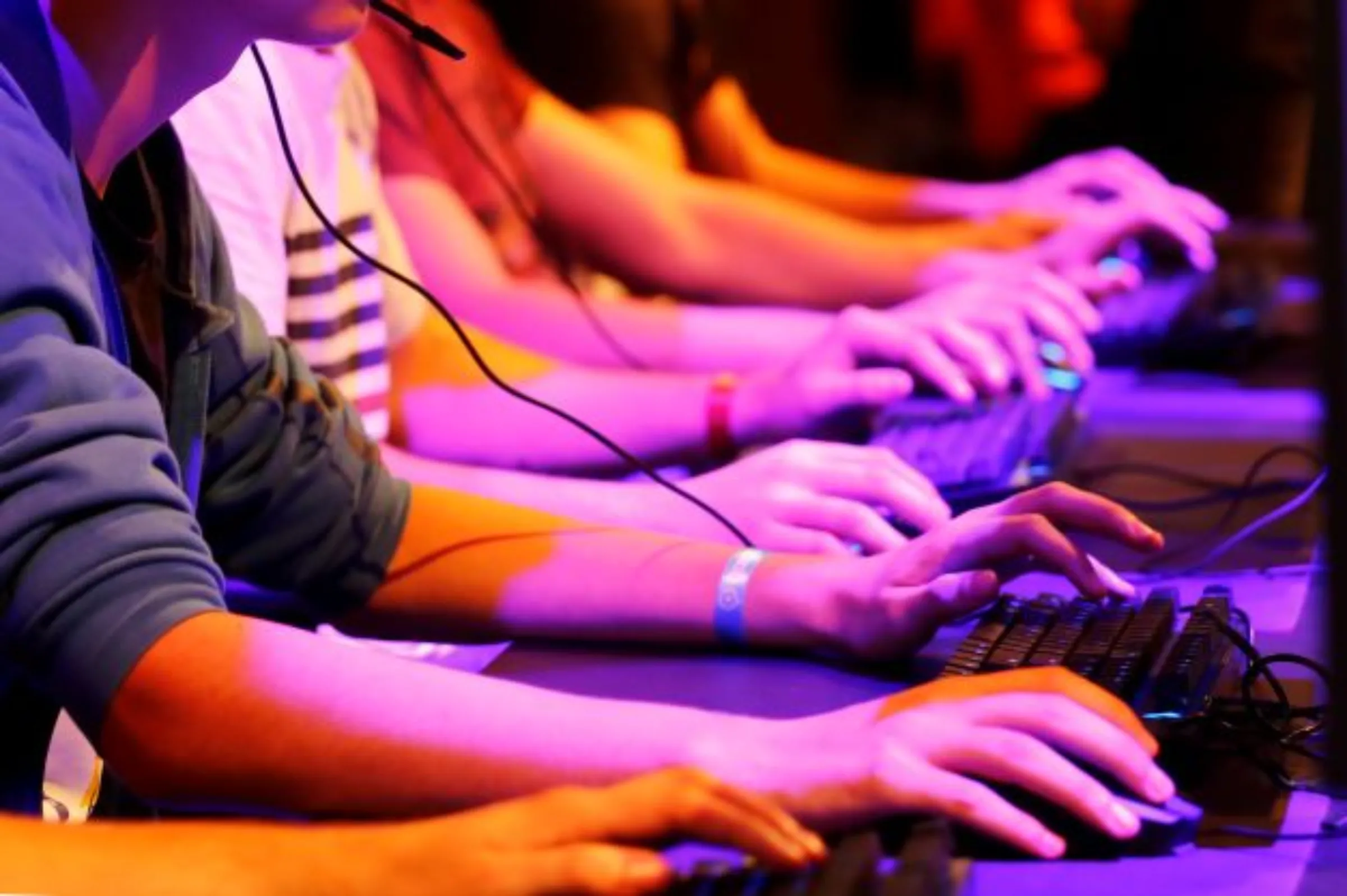 Computer gaming enthusiasts play new games on the first day of Europe's leading digital games fair Gamescom, which showcases the latest trends of the computer gaming scene in Cologne, Germany, August 21, 2019. REUTERS/Wolfgang Rattay