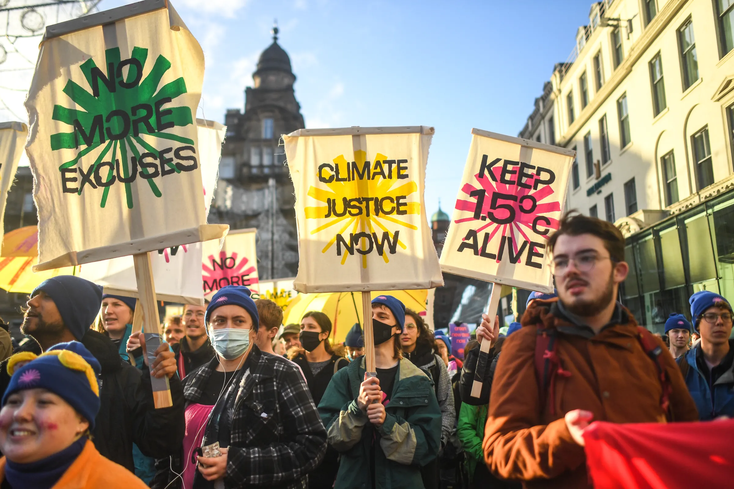 Green New Deal Rising activists protest in Glasgow during COP26. November, 2021. Green New Deal Rising/Handout via Thomson Reuters Foundation