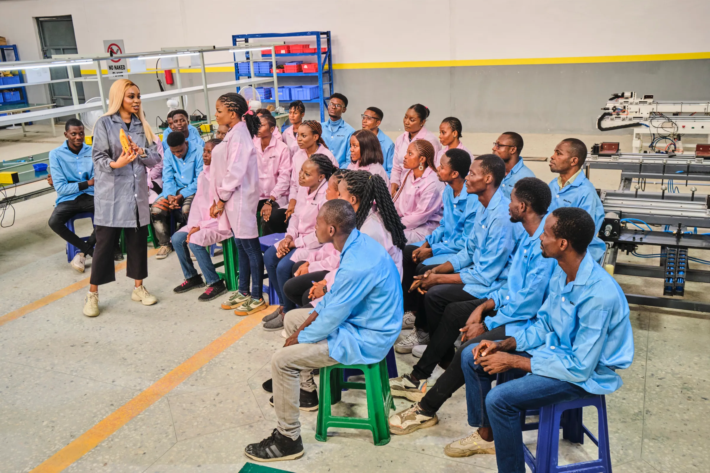Workers at her solar assembly factory in Cross River, Nigeria, in 2024. Emeka Iko/Ashden Climate Solutions/Handout via Thomson Reuters Foundation.