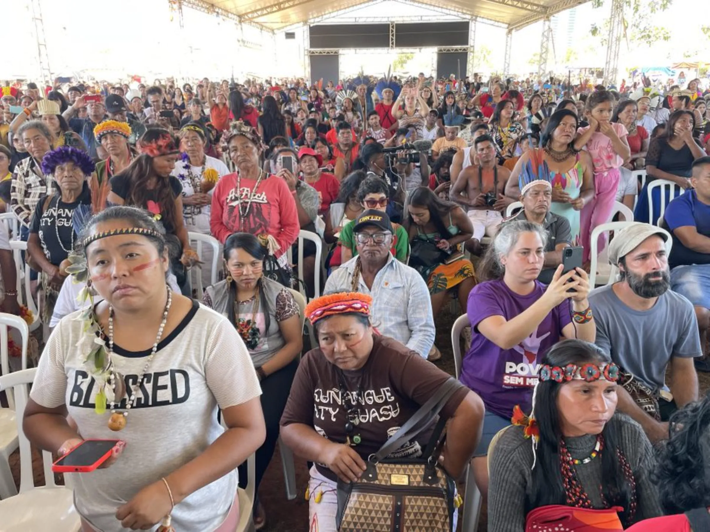 Indigenous people gather at an event during the Free Land Camp (ATL) in Brasília, Brazil, April 2023. Thomson Reuters Foundation/André Cabette Fábio