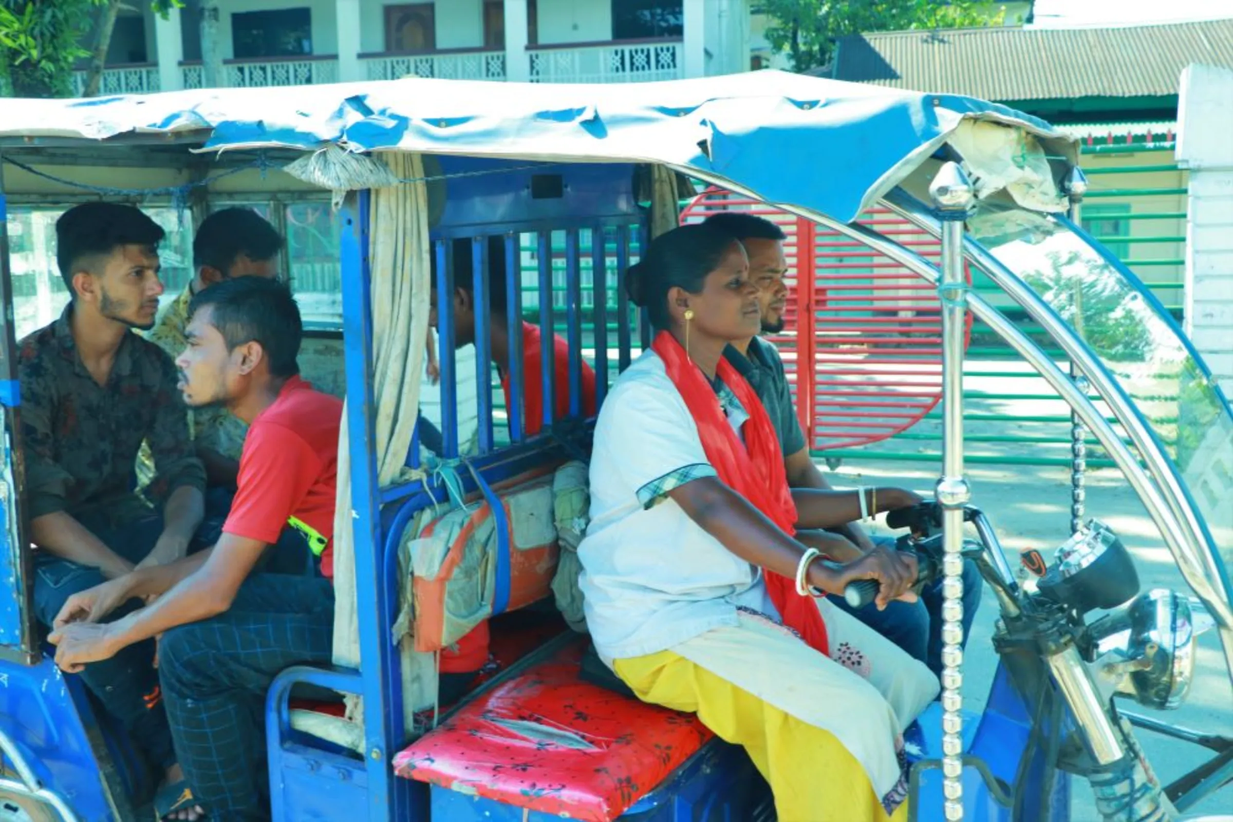 Jatri Rani Barman (32), drives an electric vehicle in the northeastern town of Sunamganj, Bangladesh, October 10, 2022