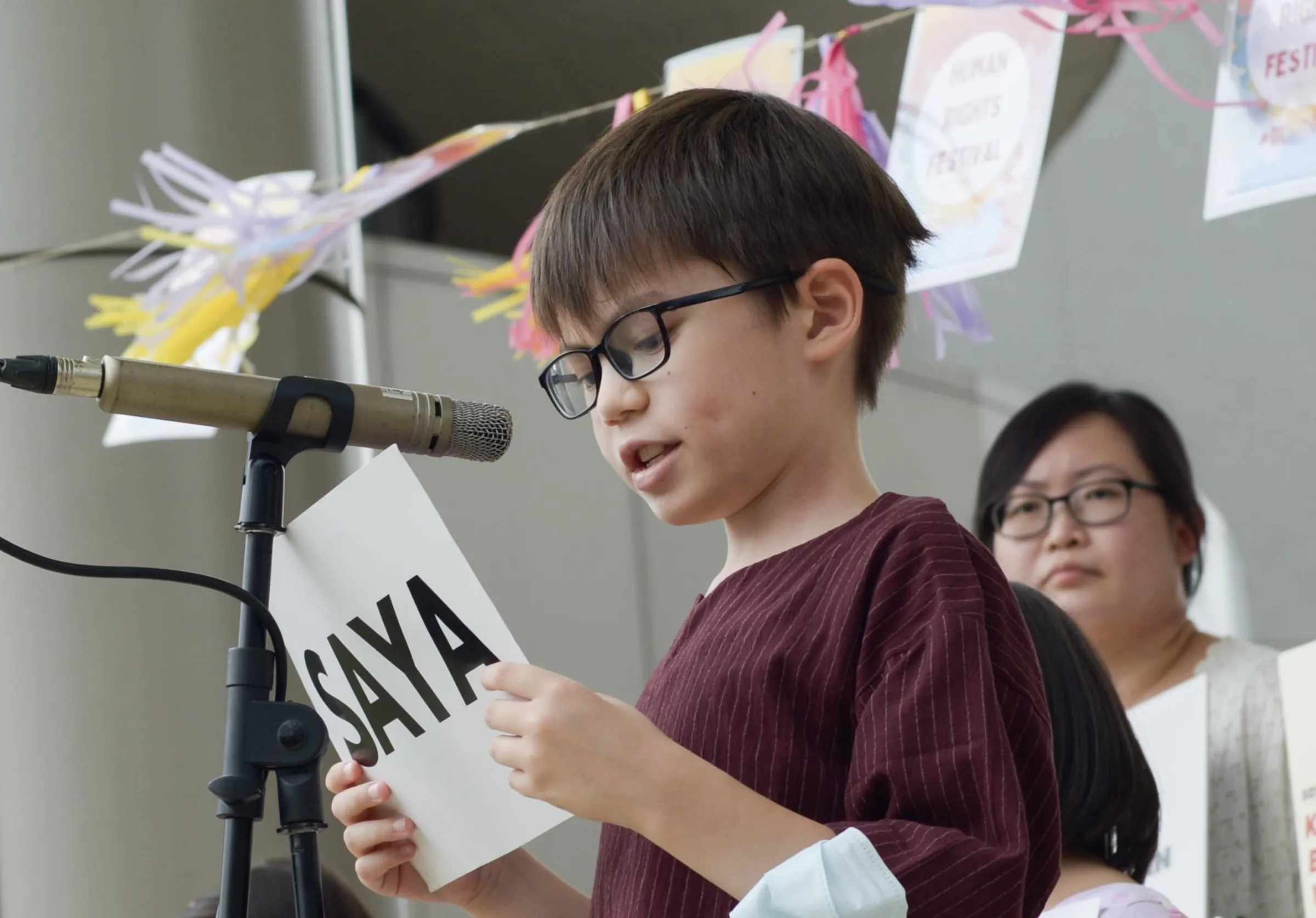 Nationality rights campaigner Patricia Low and her son Ethan are pictured at a Human Rights Festival in Kuala Lumpur in 2022. Sze Ning/Handout via Thomson Reuters Foundation