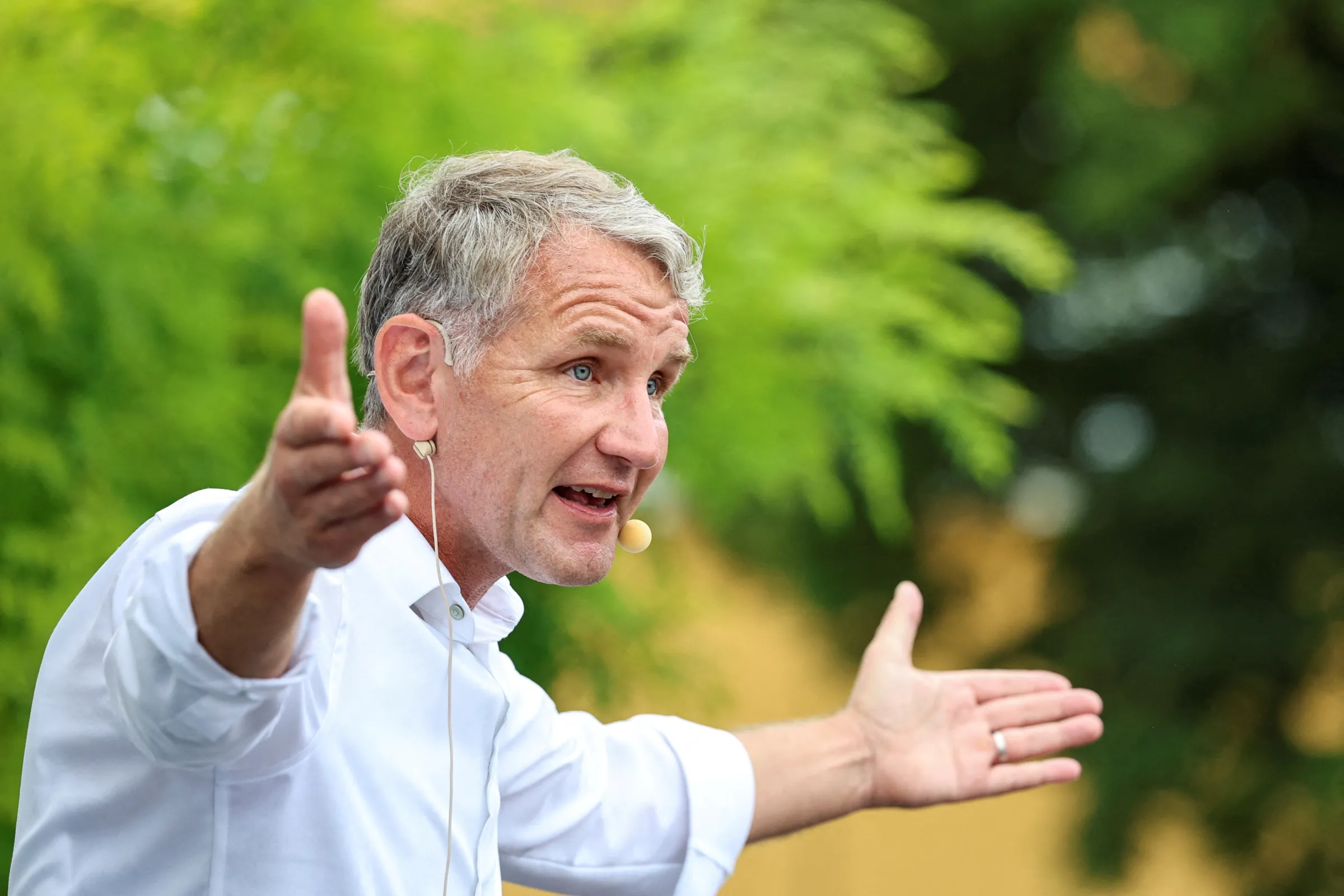 Bjoern Hoecke, leader of the Alternative for Germany in Thuringia (AfD), speaks during an election campaign rally for the Thuringia state elections in Erfurt, Germany, August 20, 2024. REUTERS/Karina Hessland