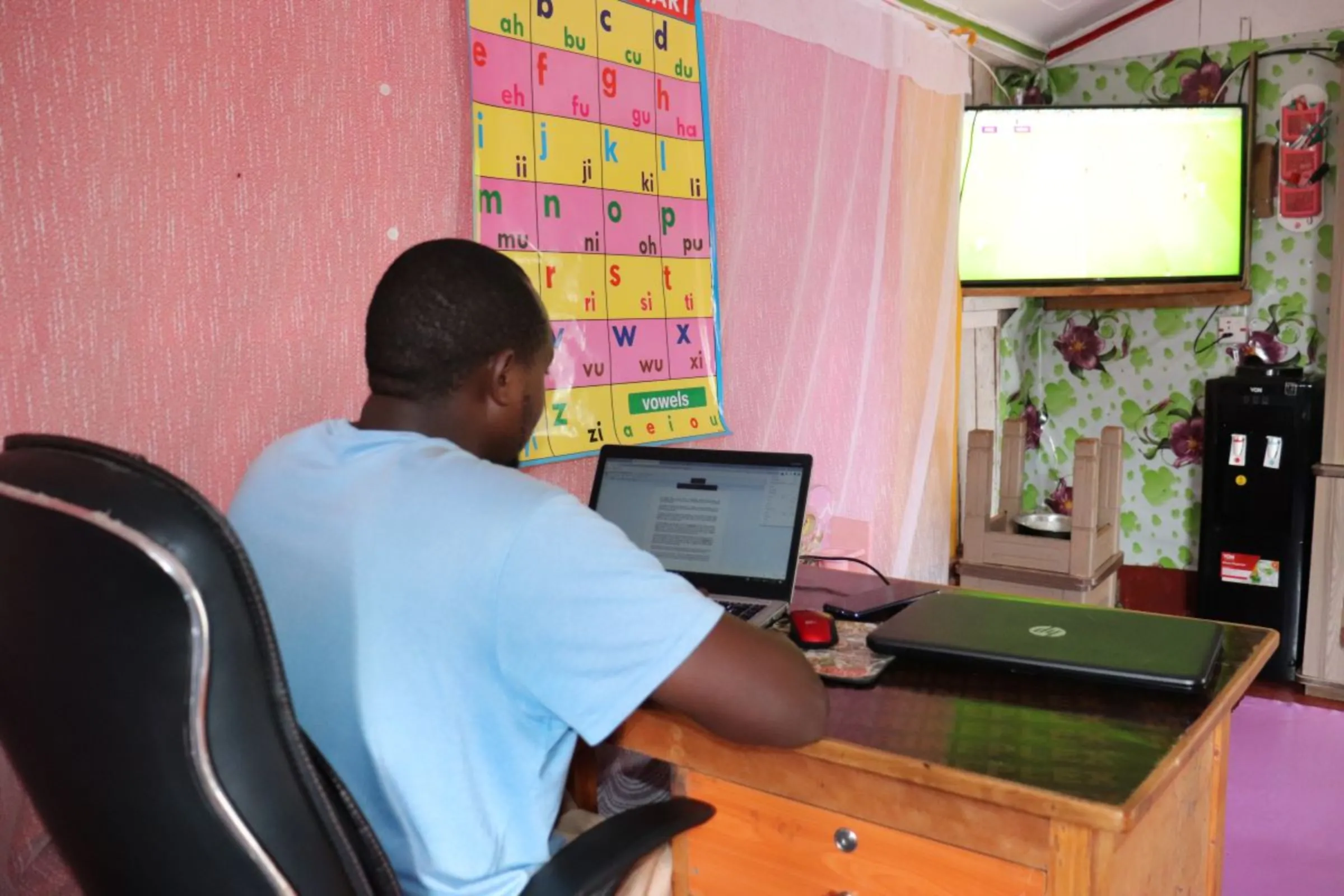 Academic writer Langat in his house in Kericho country, Kenya, May 4, 2023. Thomson Reuters Foundation/Dominic Kirui