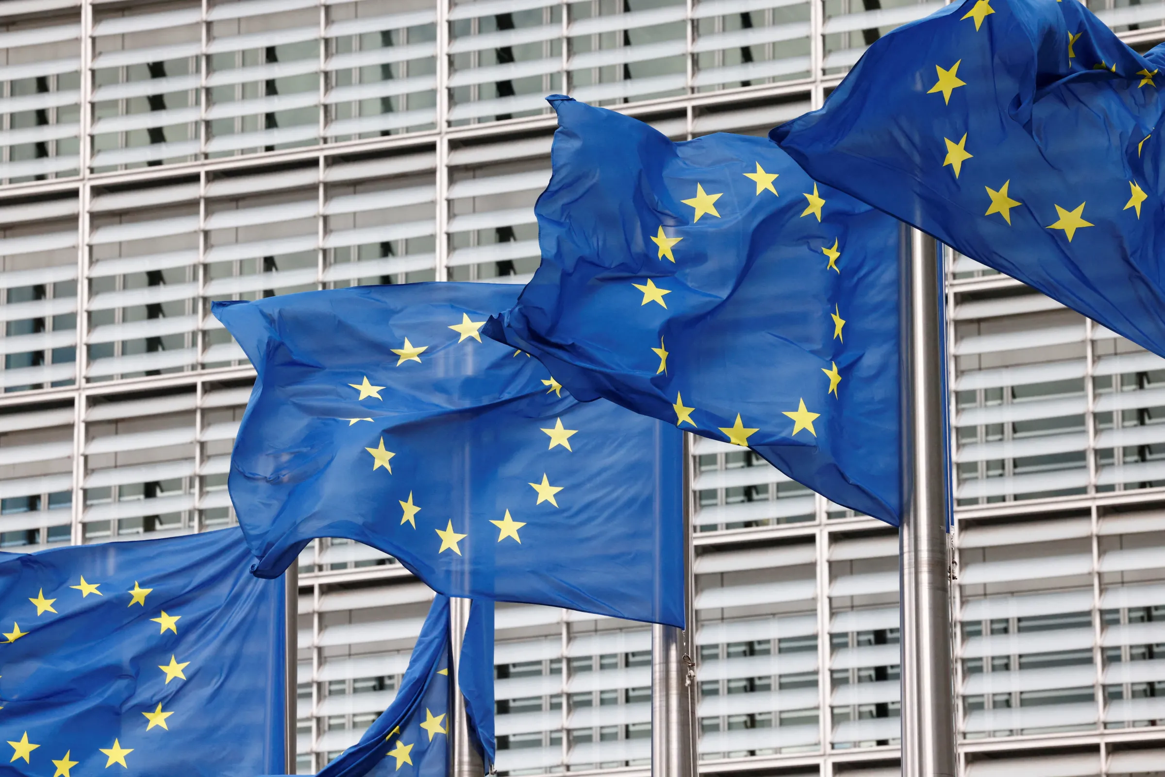 European Union flags flutter outside the EU Commission headquarters in Brussels, Belgium, September 28, 2022