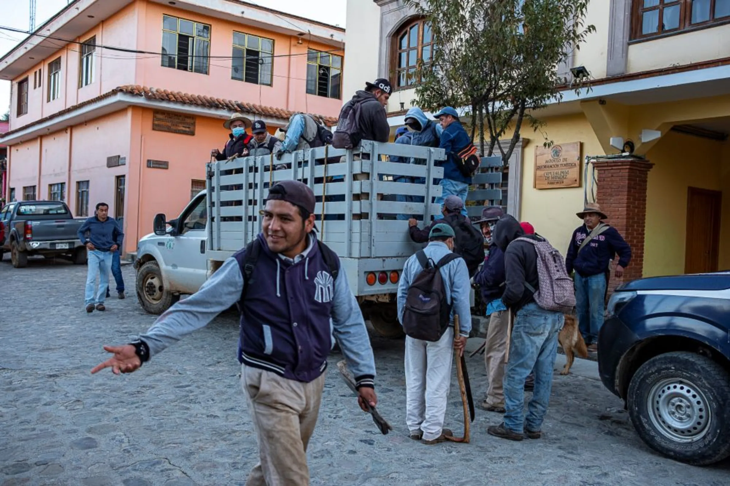 A community group prepares to go the forest to do voluntary reforestry work near Capulálpam de Mendéz, Mexico, December 11, 2022. Thomson Reuters Foundation/Noel Rojo