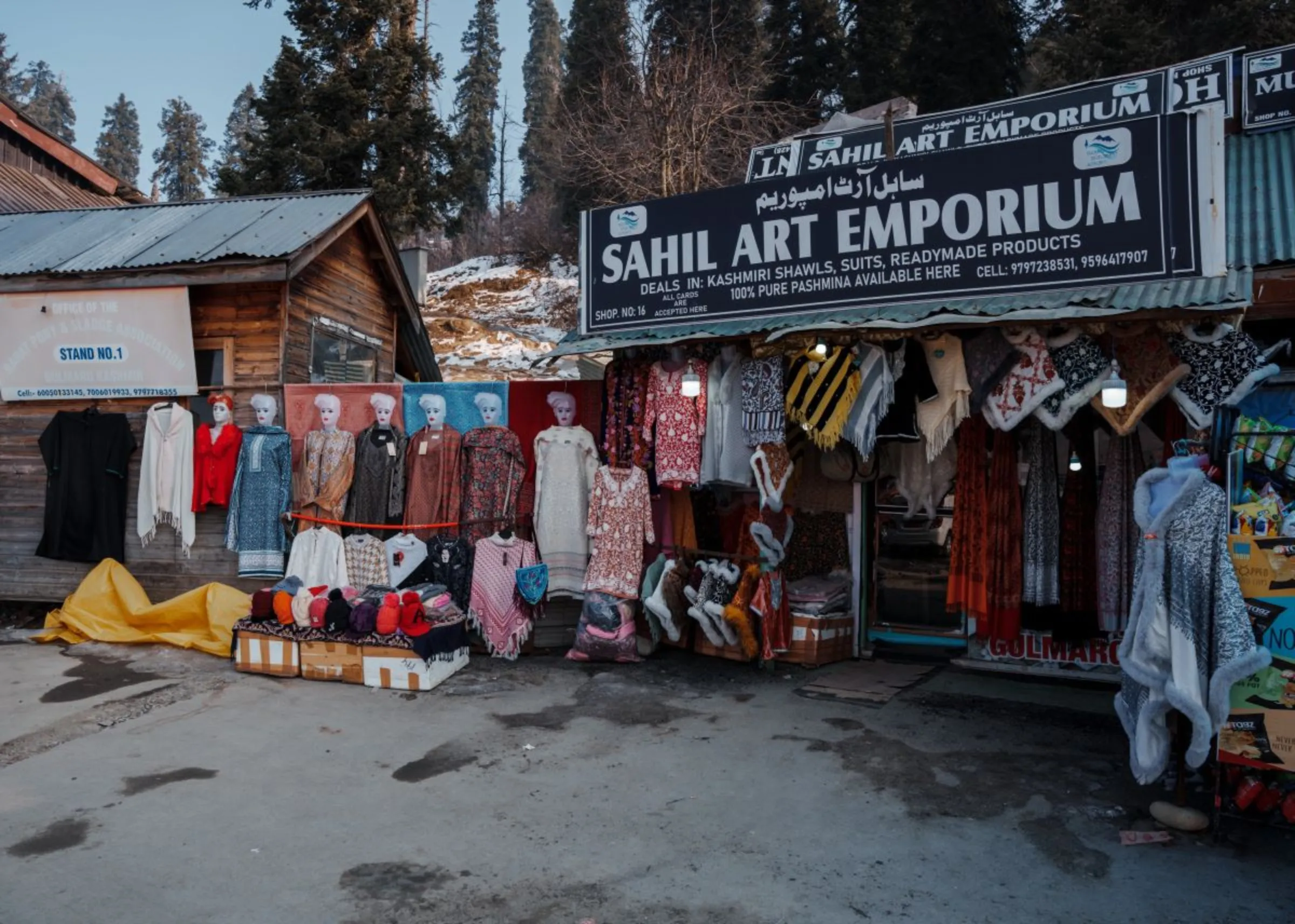 The normally bustling main market stands empty in Gulmarg, a Kashmiri winter sports town. The northern Indian region has seen little snowfall this year, keeping tourists away, Jan. 6, 2024. Thomson Reuters Foundation/Mehran Firdous