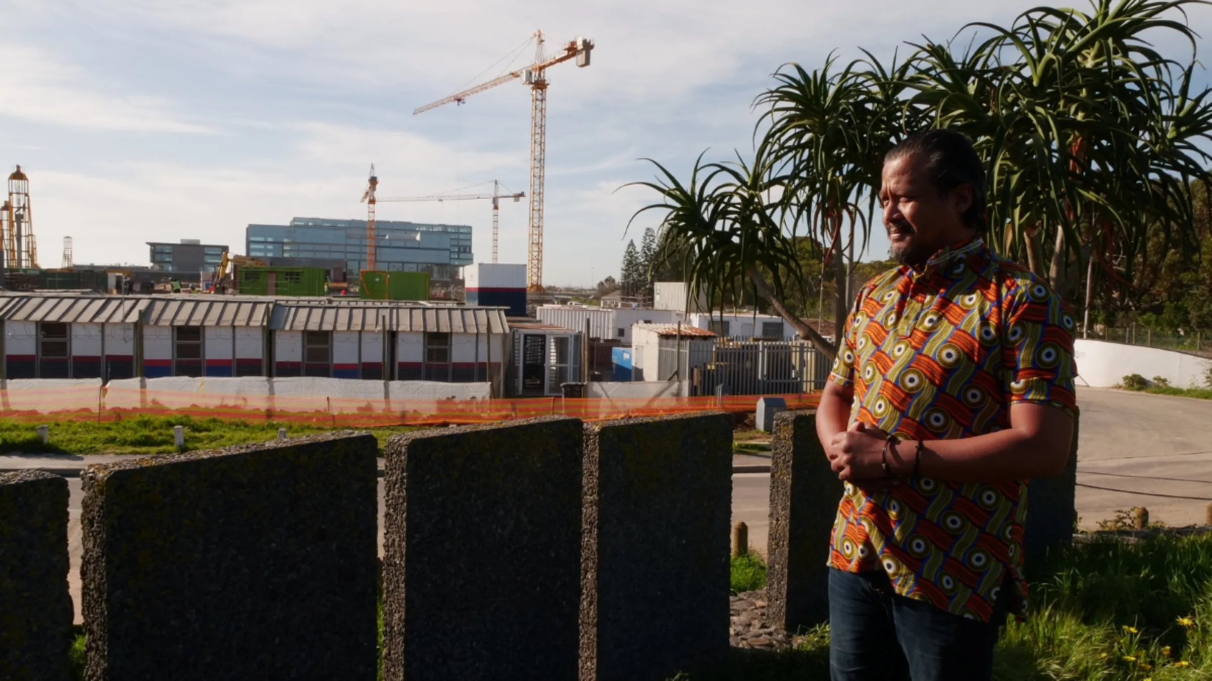 Tauriq Jenkins of the Goringhaicona Khoi Khoin Indigenous Traditional Council (GKKITC) overlooks the Riverclub construction site in Cape Town, South Africa, September 7, 2023