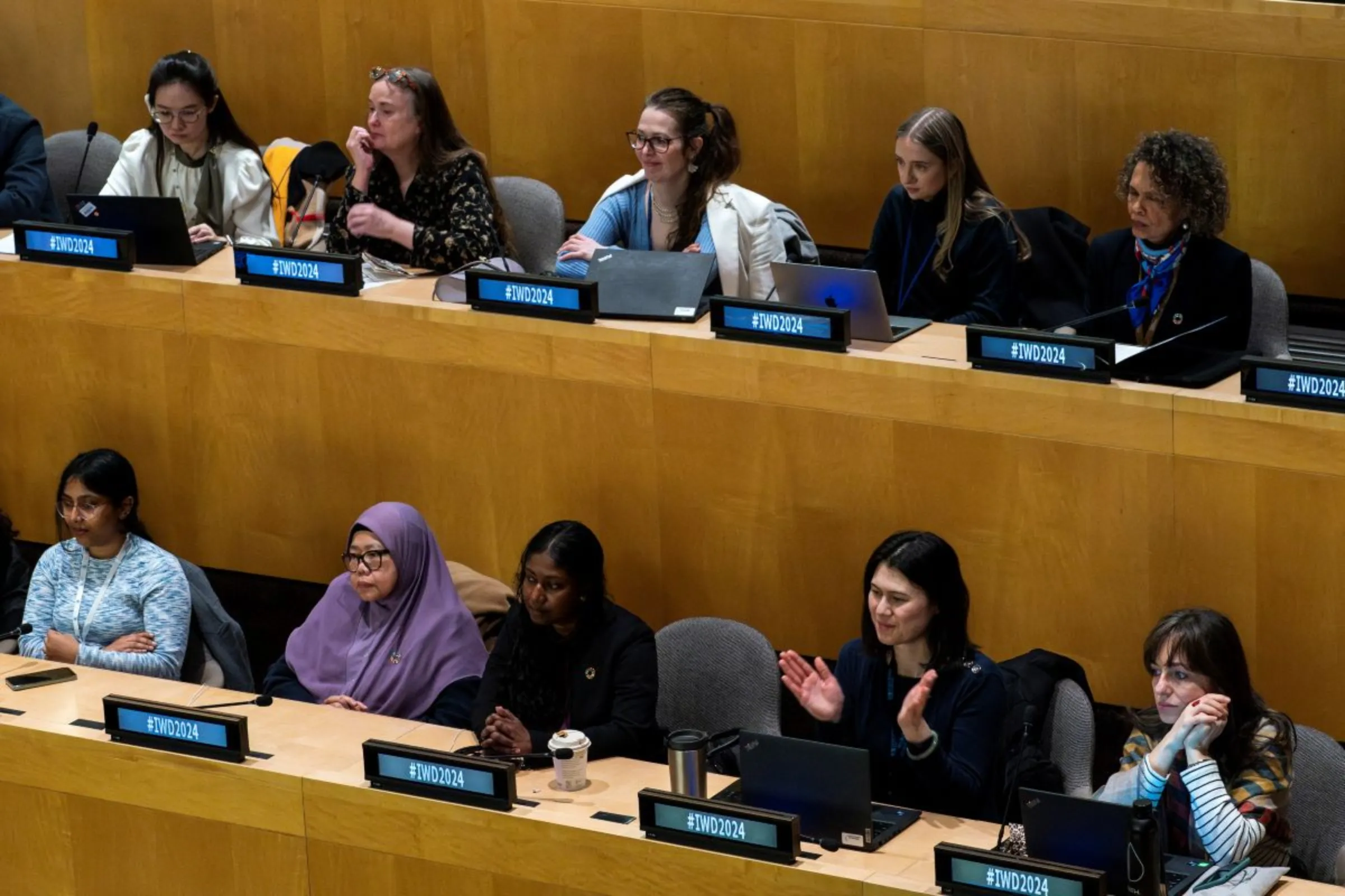 Women attend the observance of the International Women's Day 2024, at the United Nations in New York, U.S., March 8, 2024. REUTERS/Eduardo Munoz