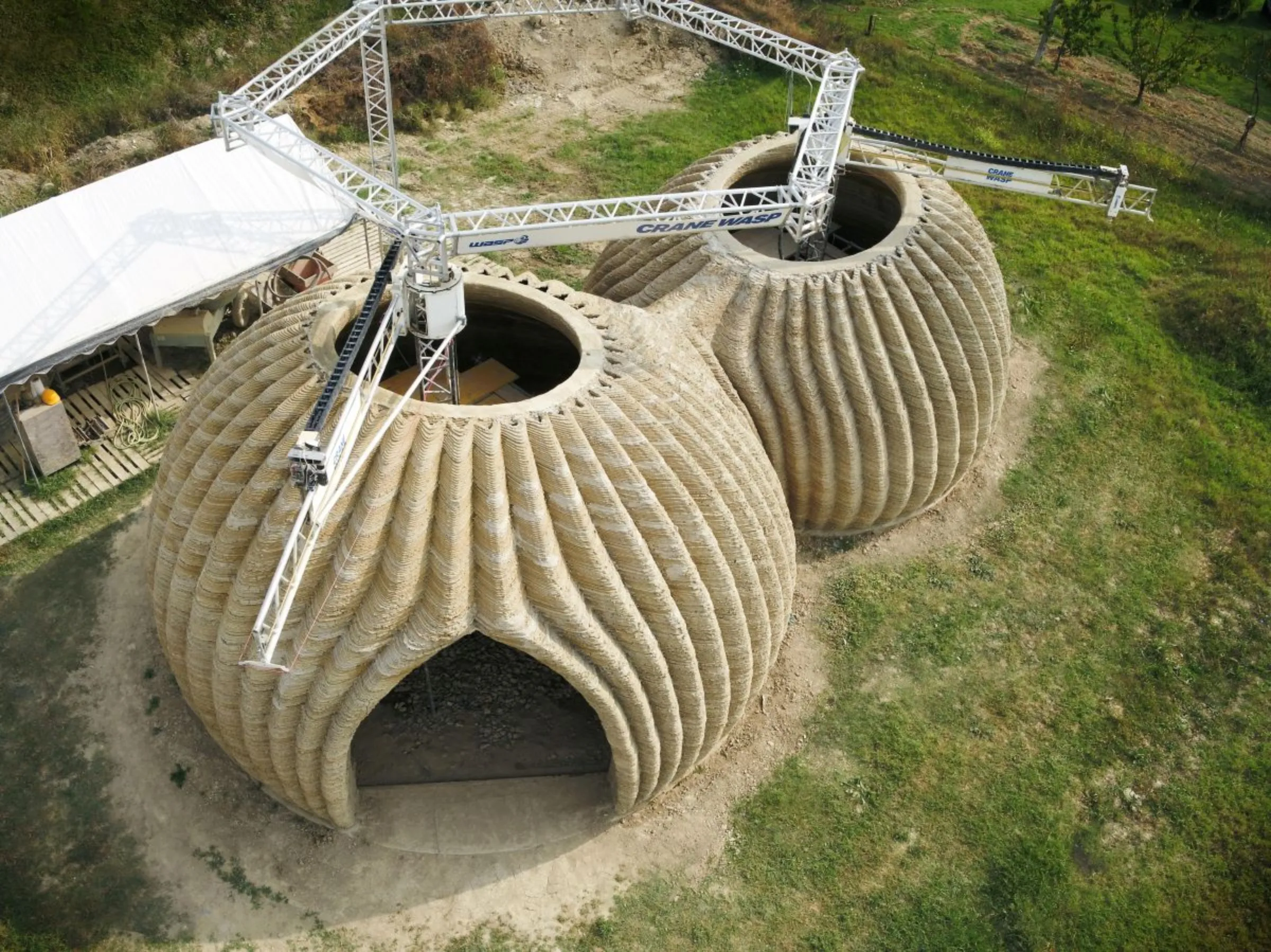 An eco-friendly 3D-printed house known as TECLA, made entirely of sustainable recyclable materials sourced from local soil by Italian 3D print manufacturers WASP, is seen in Ravenna, Italy, January 20, 2021. TECLA 3D printed house by WASP/Handout via REUTERS