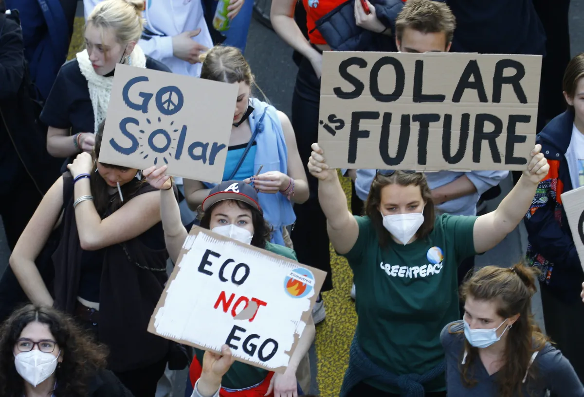 Young protesters display posters as part of the Global Climate Strike of the movement Fridays for Future