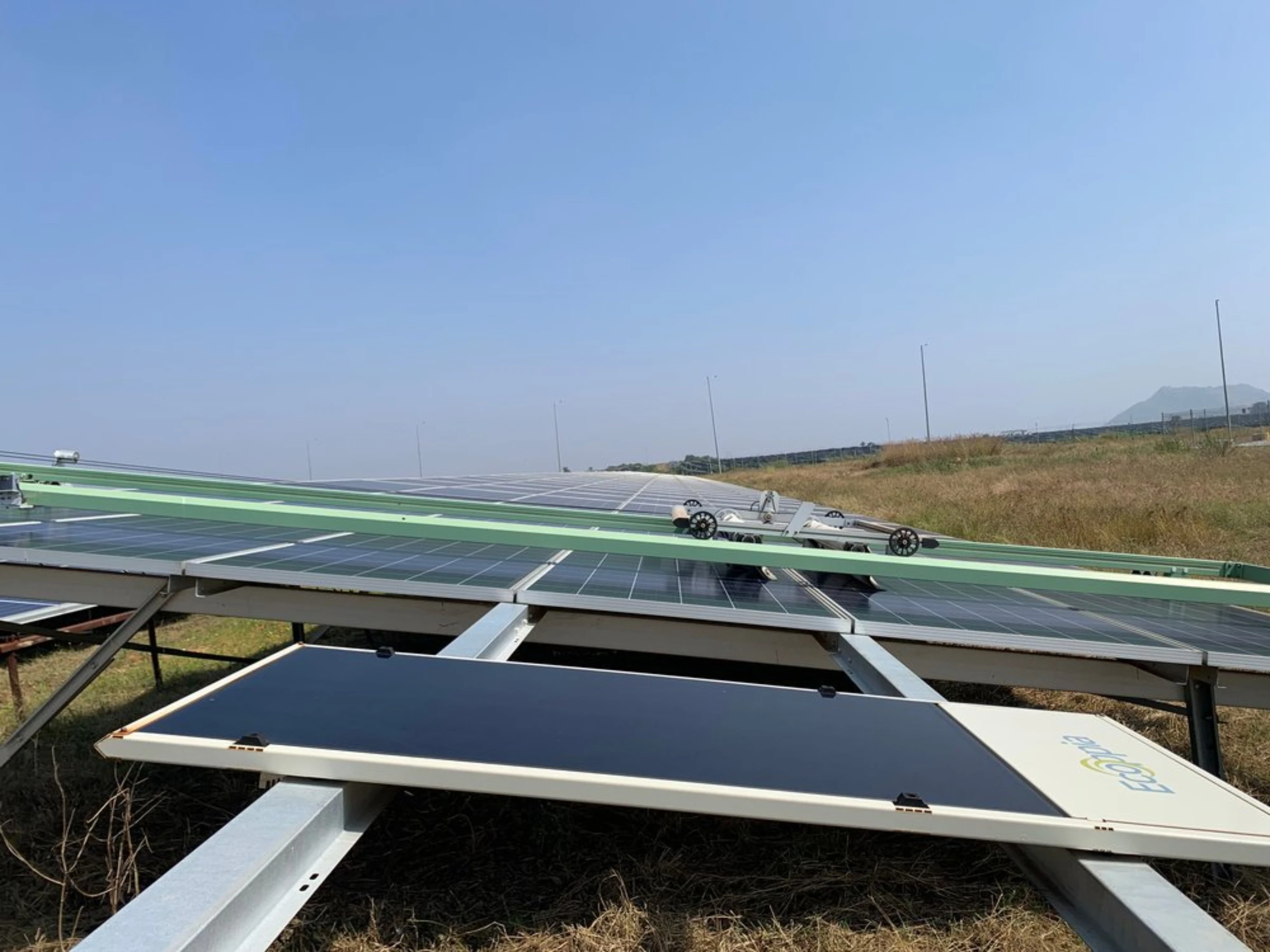 A robotic solar panel cleaner in operation at the Pavagada solar park in Karnataka, India, December 27, 2021