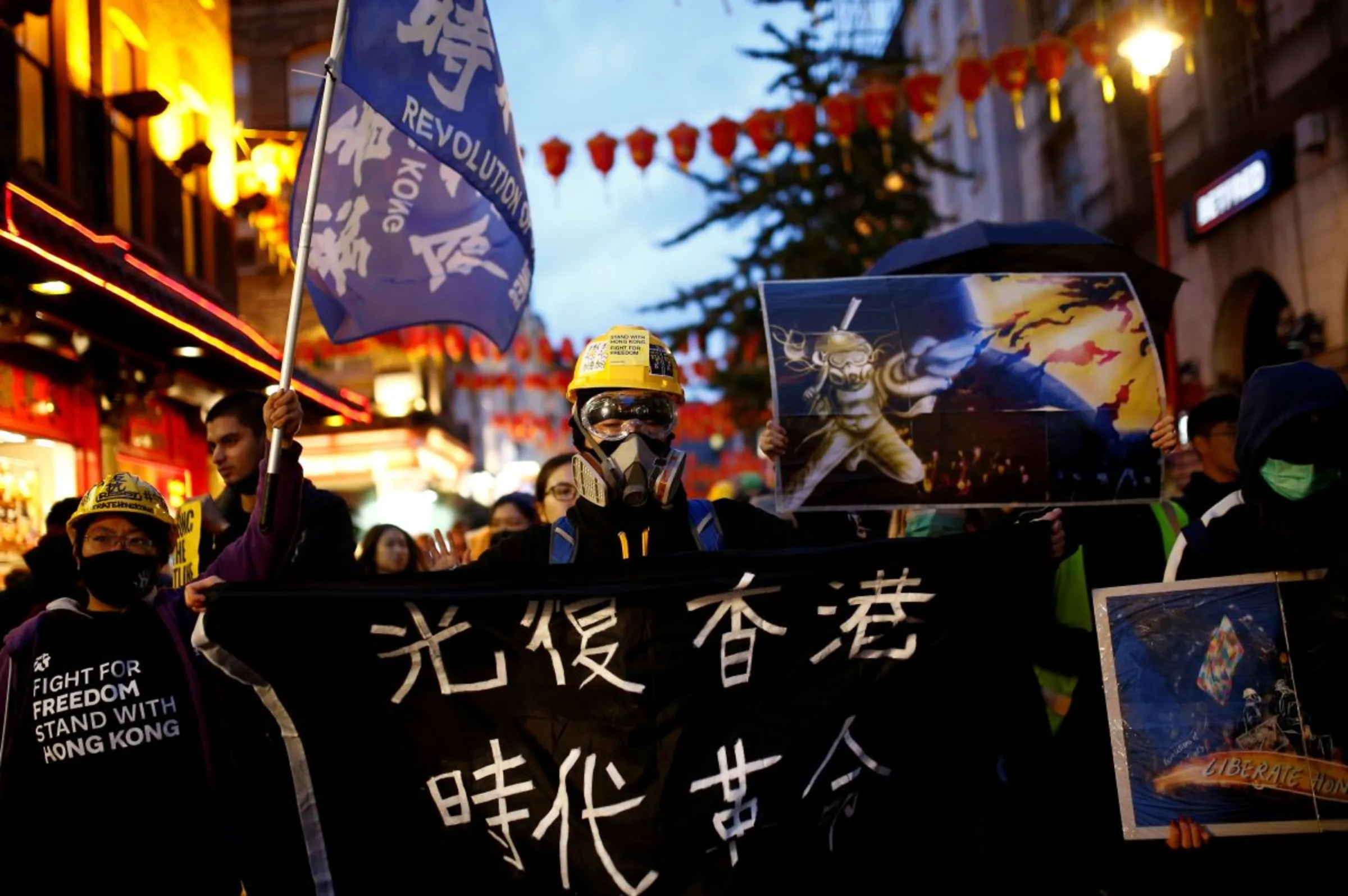 Demonstrators march during a 'Stand with Hong Kong' rally in London, Britain, November 2, 2019
