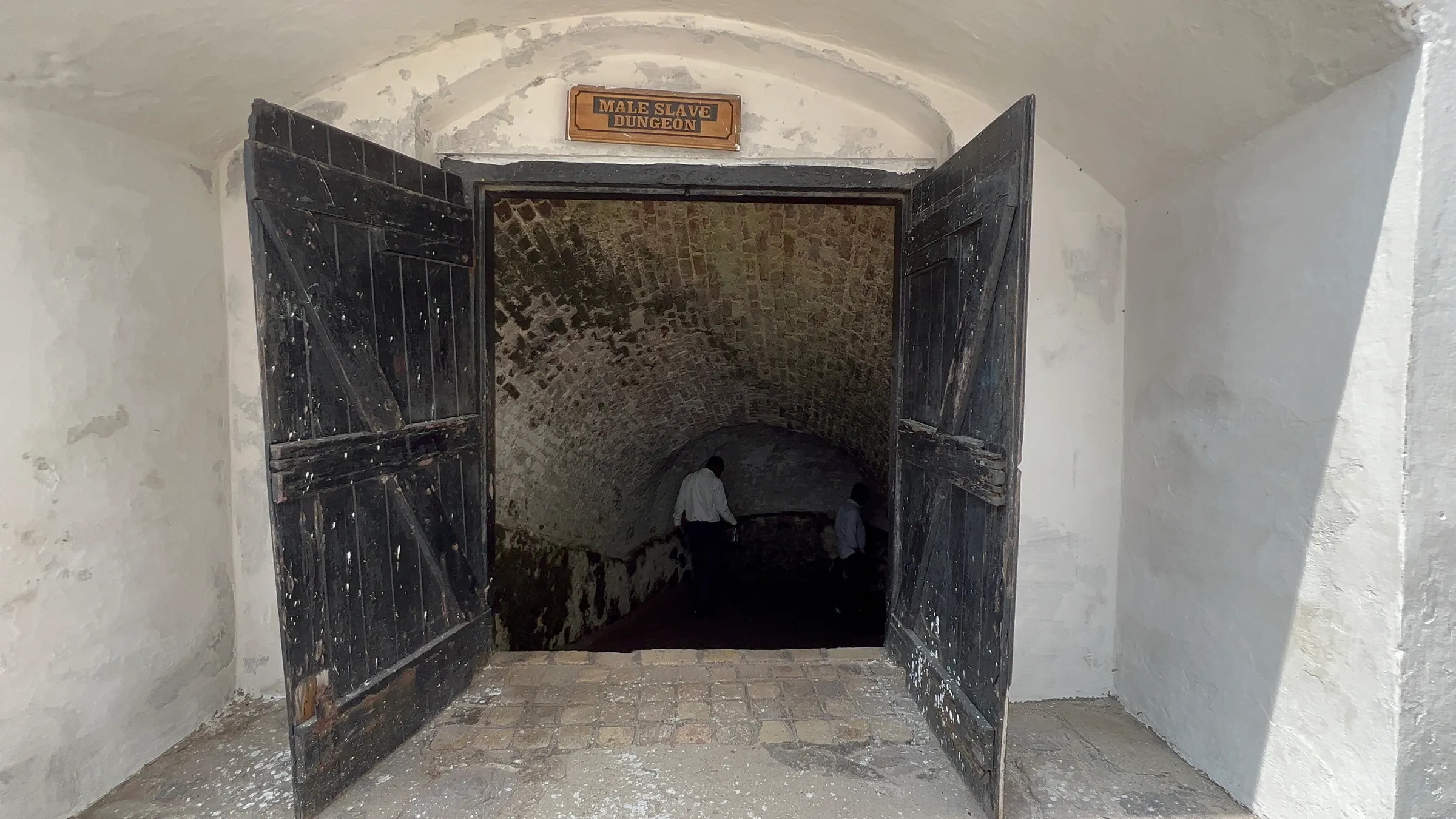 Entrance to the male slave dungeons at Cape Coast Castle on the Cape Coast, Ghana on Aug 9, 2022
