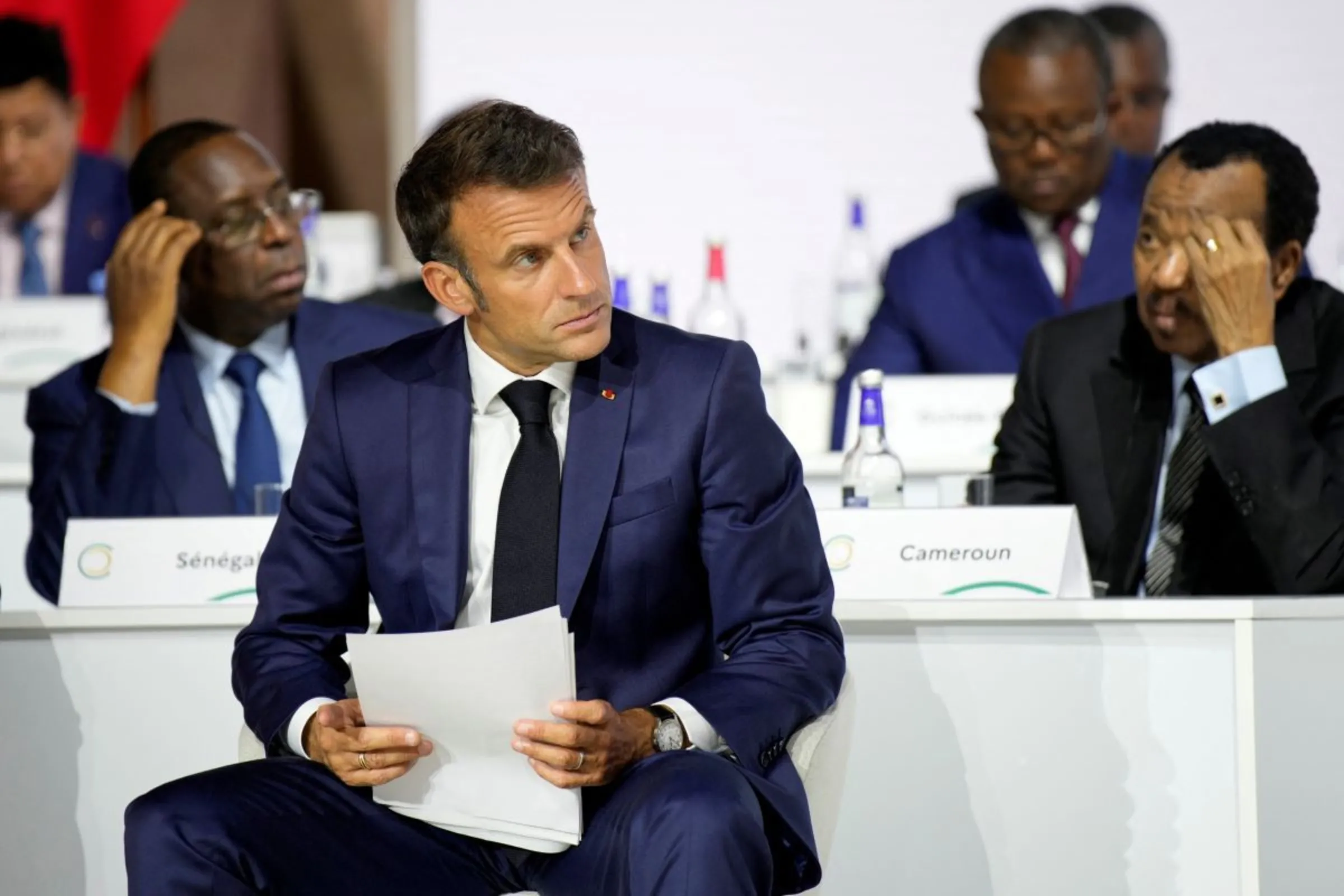 French President Emmanuel Macron listens during the closing session of the New Global Financial Pact Summit, Friday, June 23, 2023 in Paris, France. Lewis Joly/Pool via REUTERS