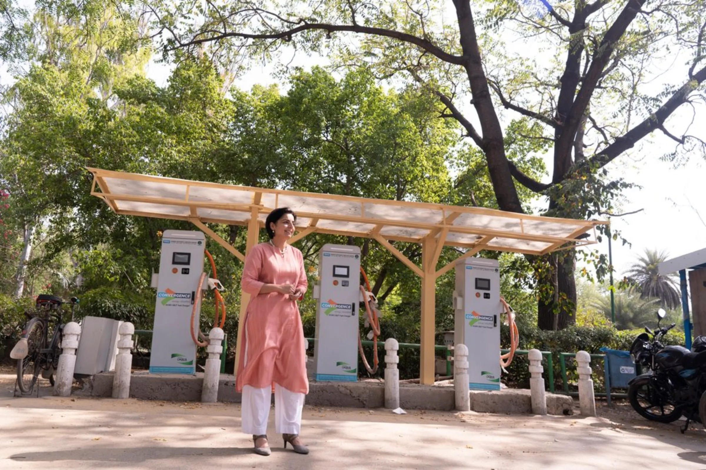 Mahua Acharya, CEO of Convergence Energy Services Limited, poses for a picture at an electric vehicle charging station in Delhi, April 6, 2022