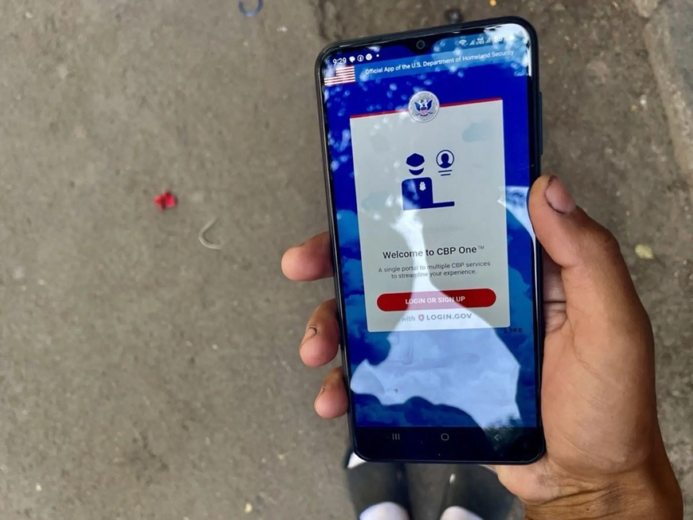 Venezuelan asylum seeker, Alessandra Castillo, shows the CBP One app on her phone at a migrant camp in Mexico City, Mexico, April 29, 2024. Thomson Reuters Foundation/Diana Baptista