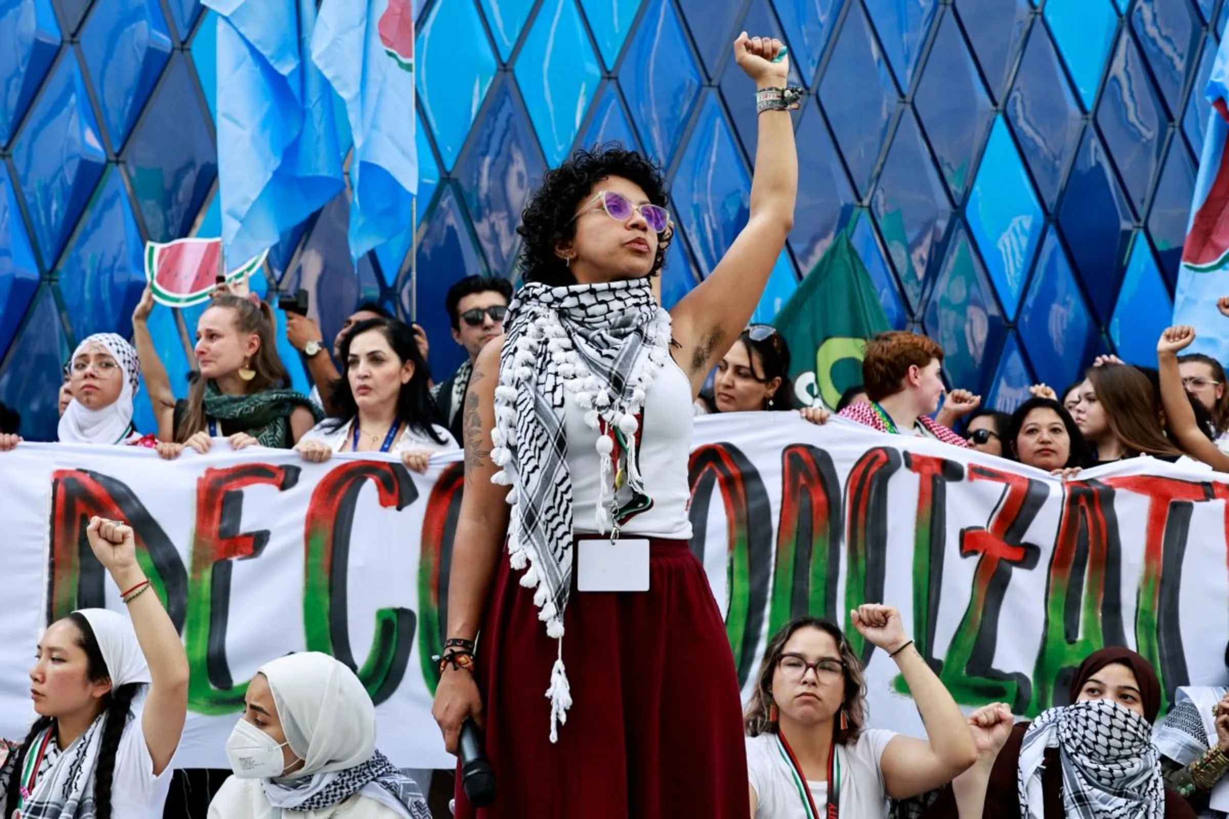 Climate activists protest in support of Palestinians in Gaza, at the United Nations Climate Change Conference (COP28) in Dubai, United Arab Emirates, December 3, 2023