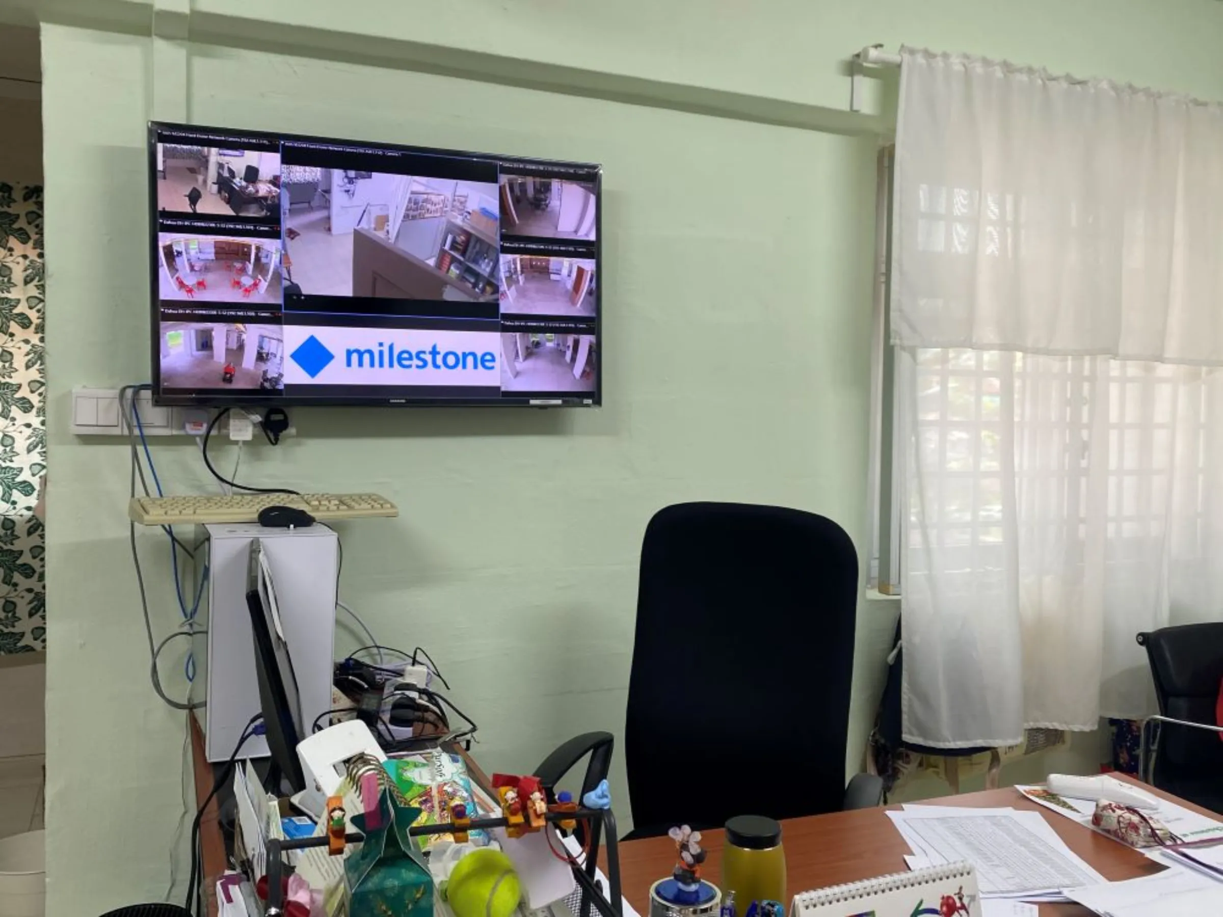 A screen showing the feed from CCTV cameras placed in common areas to monitor elderly residents in a housing block in Singapore. December 9, 2022. Thomson Reuters Foundation/Rina Chandran