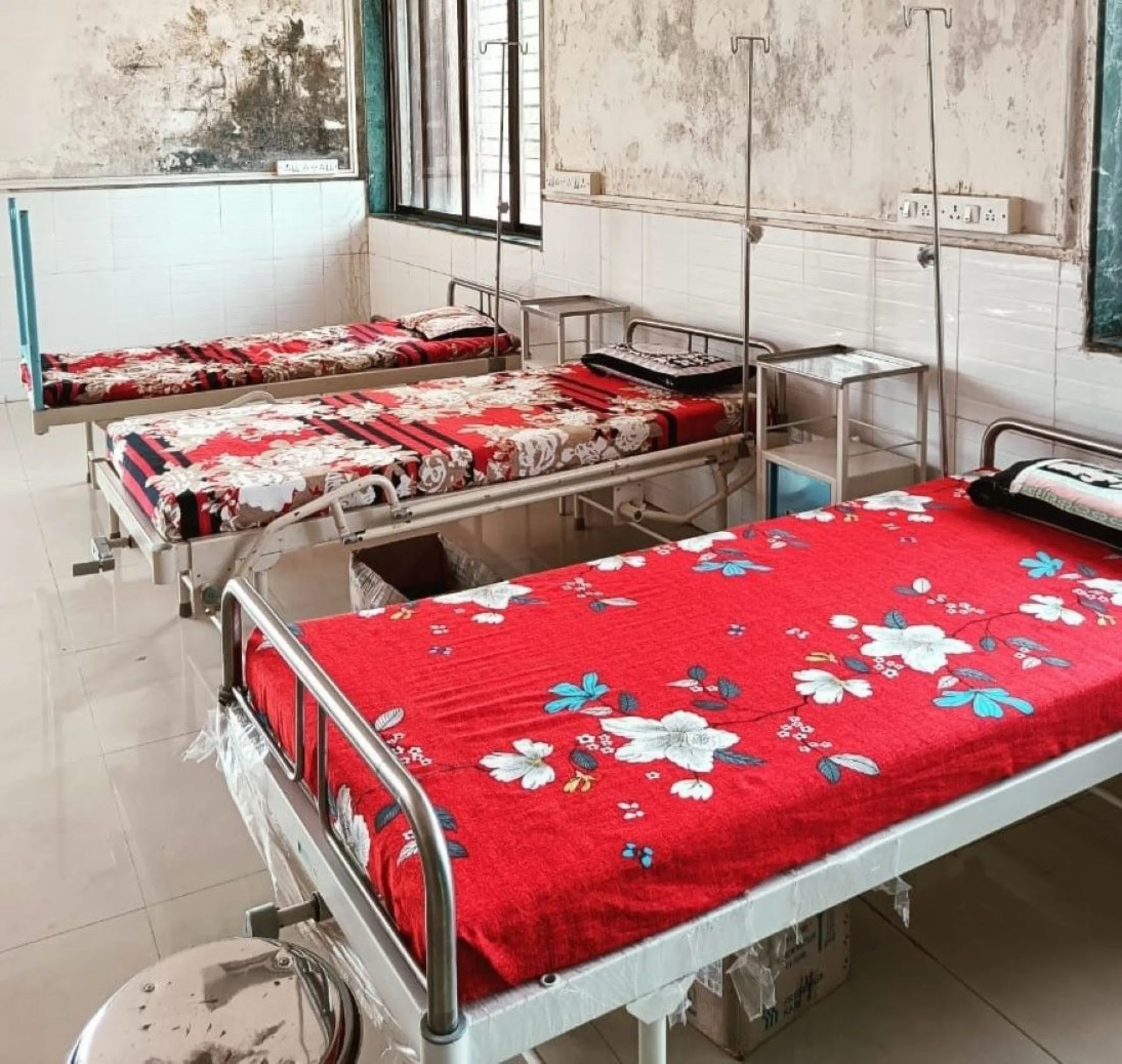 A view of beds in a hospital that has been affected by the Indian government’s crackdown on foreign funding for NGOS in Anjanwel, India, May 24, 2024. Thomson Reuters Foundation/Kunal Purohit.