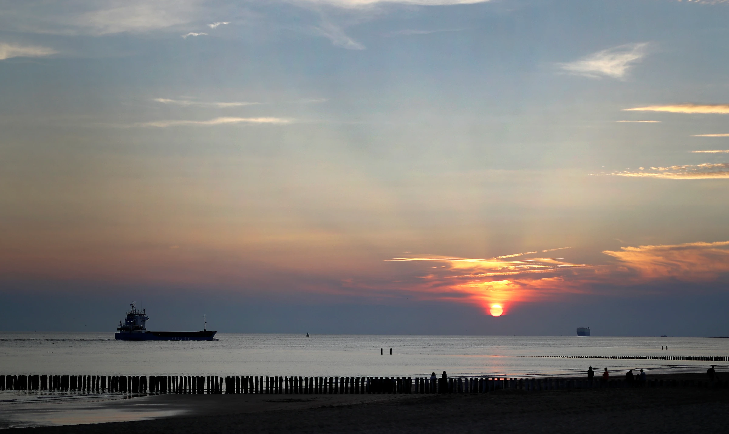 A cargo ship is seen at the North Sea from the beach of Dishoek, Netherlands, July 19, 2018. REUTERS/ Kai Pfaffenbach