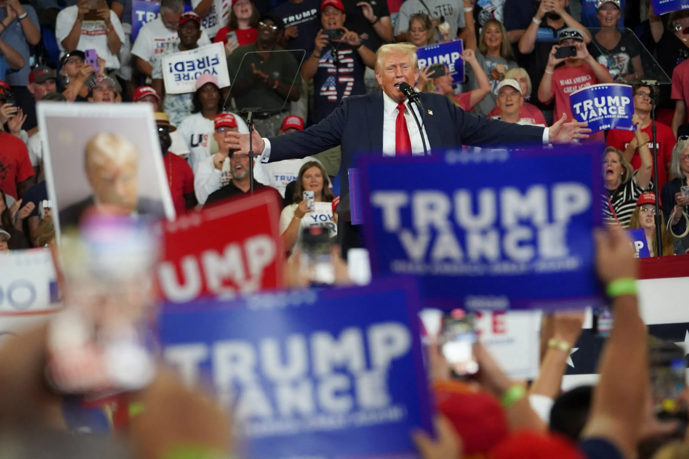 Republican presidential nominee and former U.S. President Donald Trump speaks during a campaign rally held with Republican vice presidential nominee Senator JD Vance, in Atlanta, Georgia, U.S., August 3, 2024. REUTERS/Megan Varner