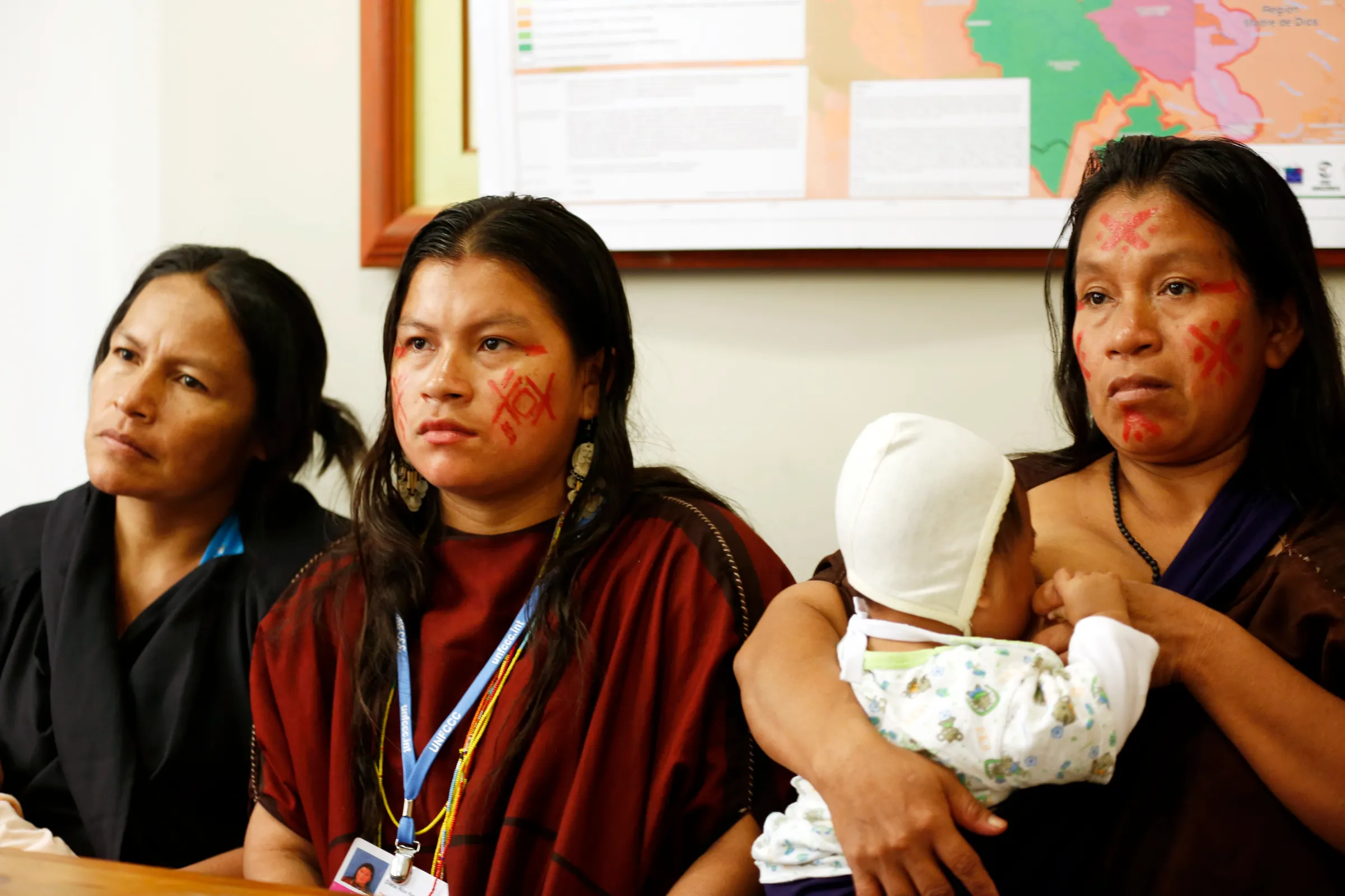 (From L to R) Julia Perez, widow of murdered environmental activist Edwin Chota, Diana Rios and Ergilia Rengifo, daughter and widow of murdered Ashaninka leader Jorge Rios, attend a news conference in Lima, December 3, 2014. REUTERS/Mariana Bazo