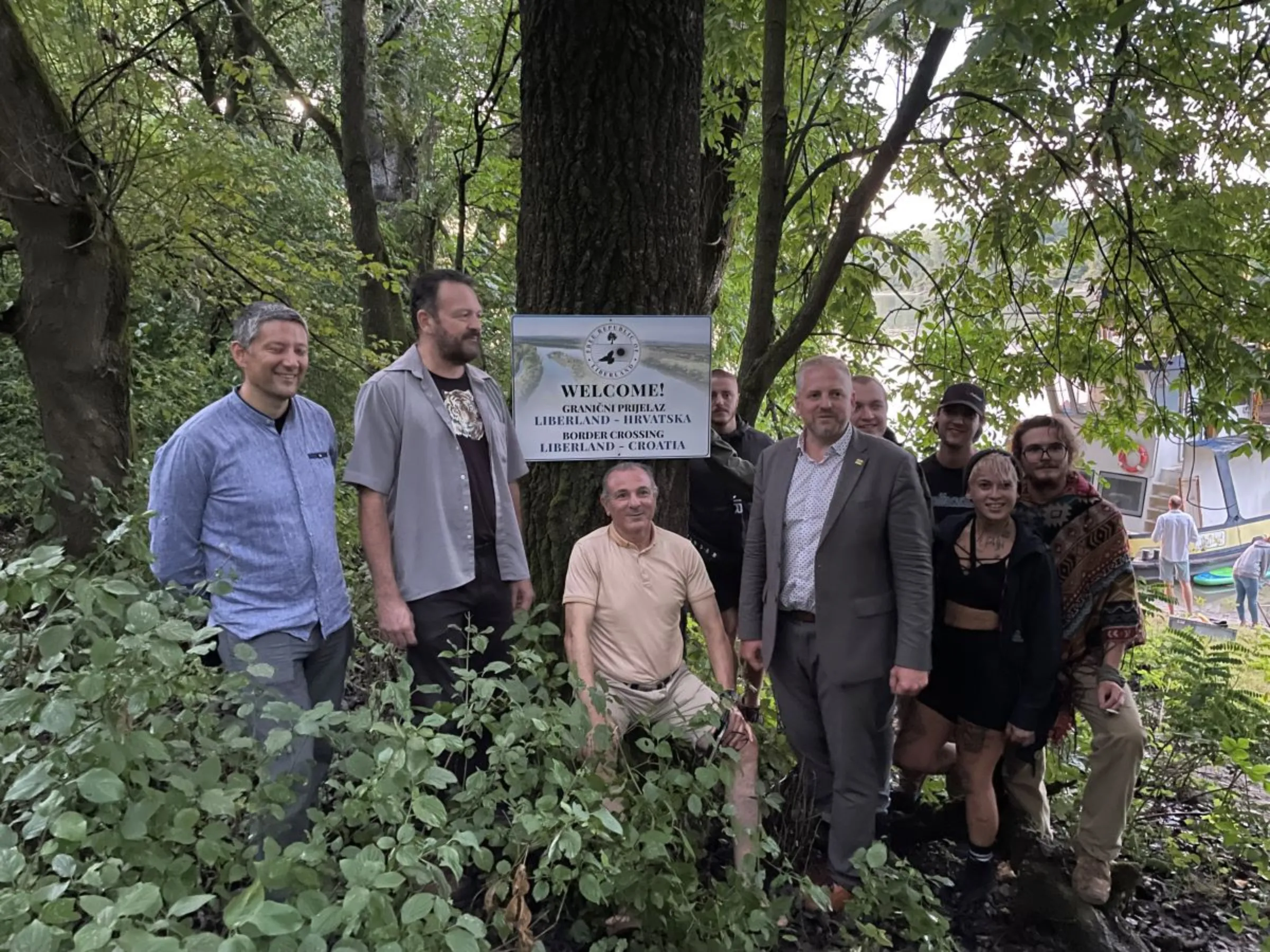 Liberland citizens and supporters, putting up the sign for what they say is a de facto border between Croatia. 6 August 2023