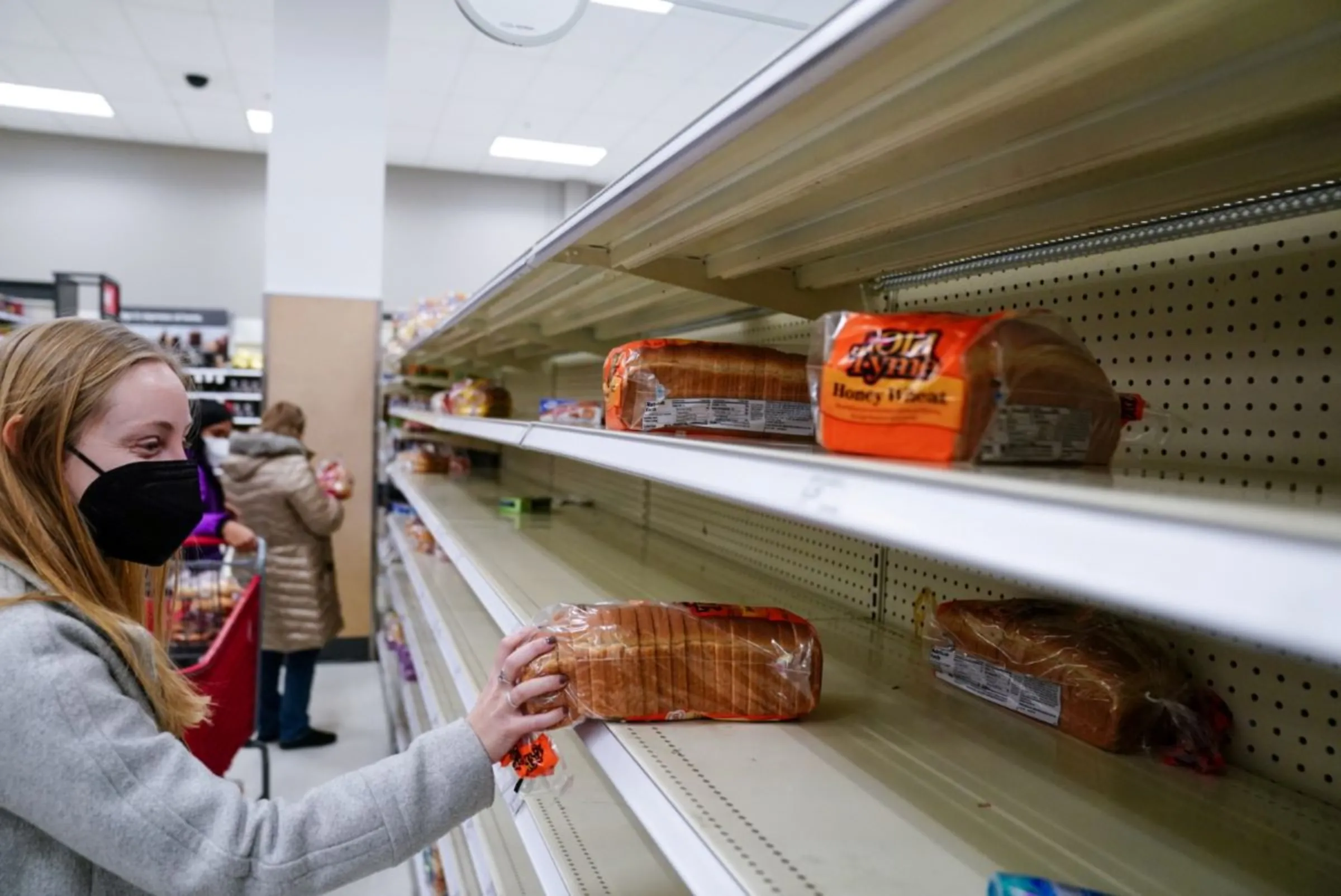 Shelves at a Target are seen nearly empty in Washington, U.S., January 9, 2022. REUTERS/Sarah Silbiger