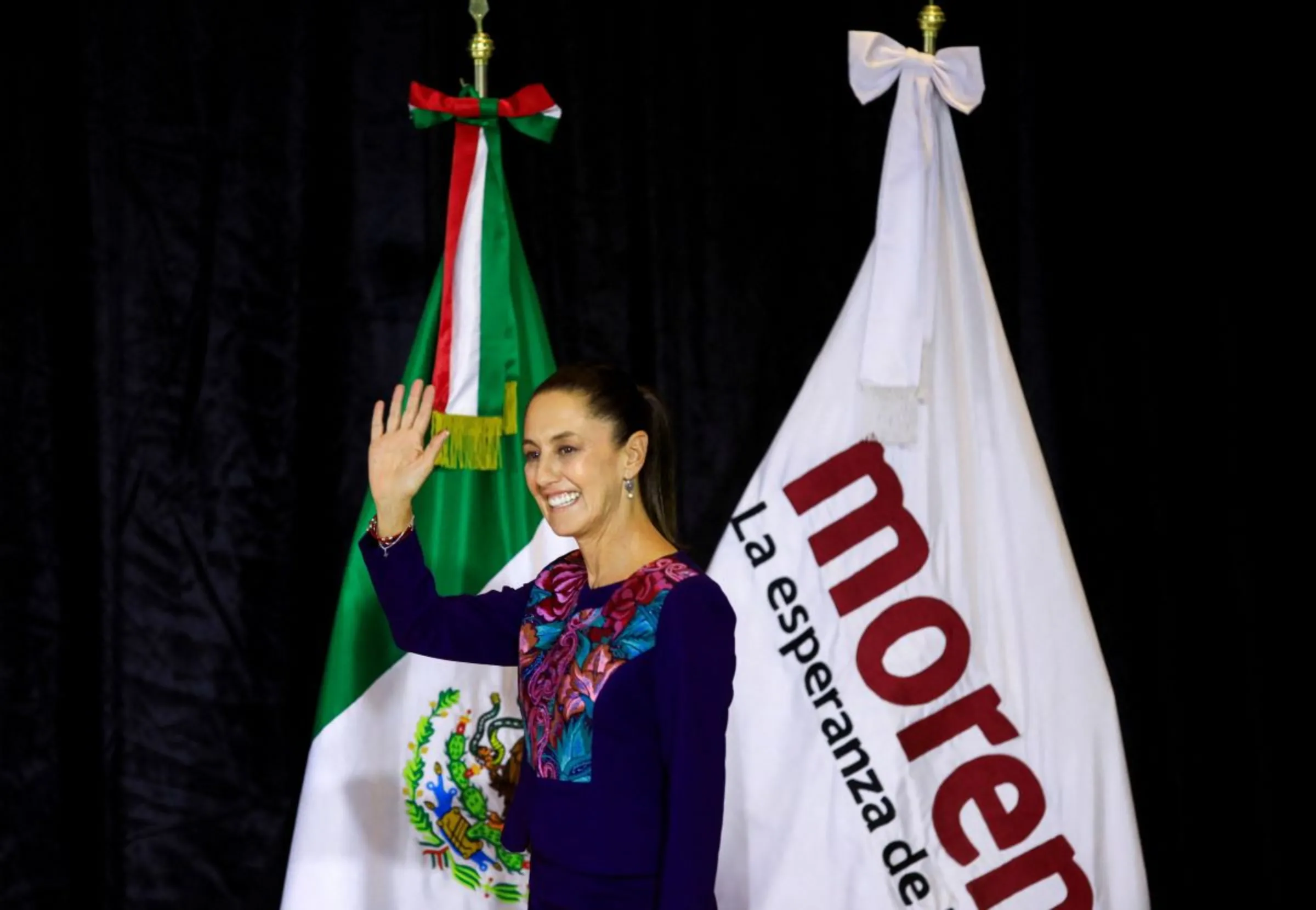 Claudia Sheinbaum, presidential candidate of the ruling MORENA party, waves after winning the election, in Mexico City, Mexico June 3, 2024. REUTERS/Raquel Cunha