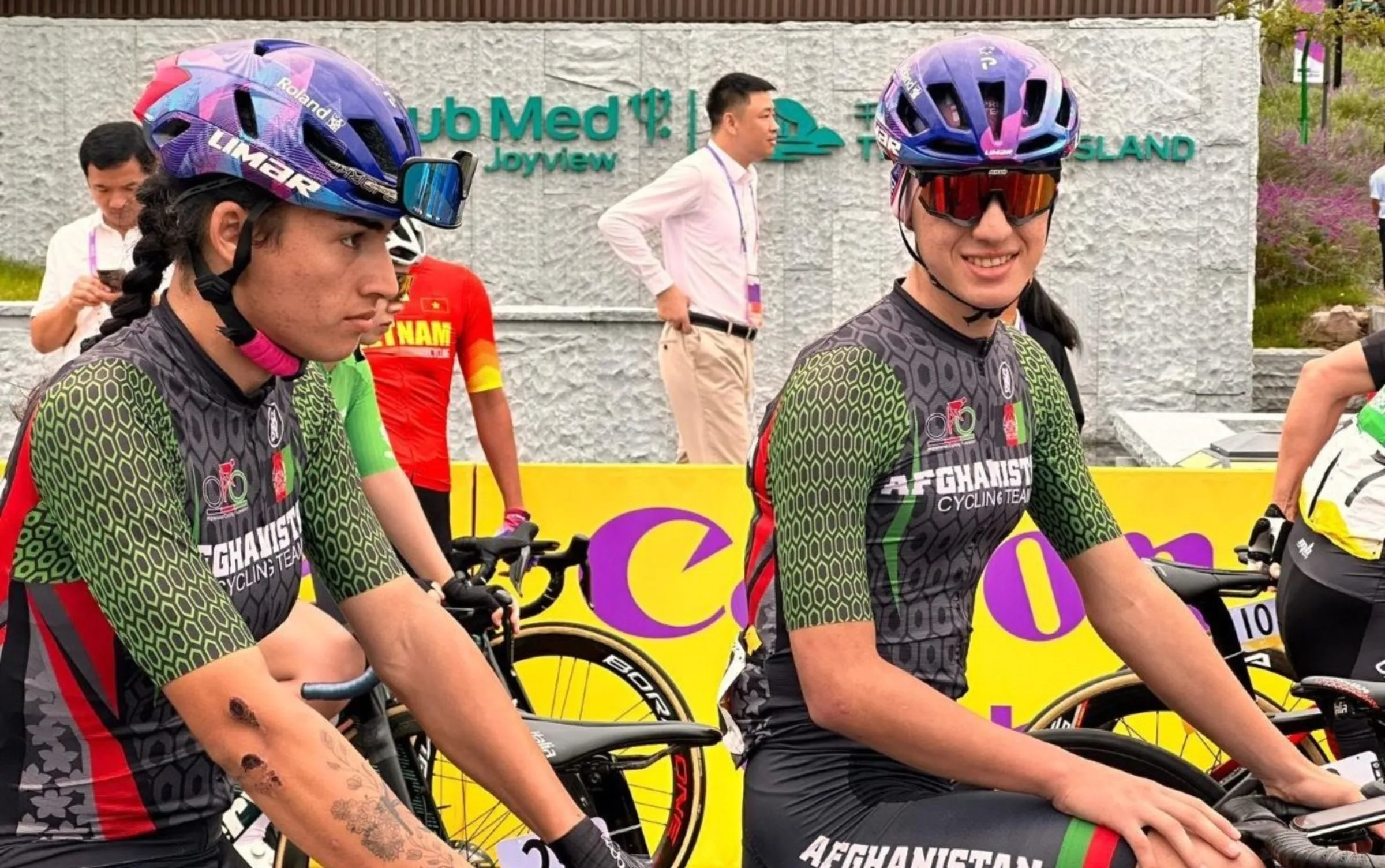 The Hashimi sisters are pictured on their bikes at the 2023 Asian Games in Hangzhou, China. Afghanistan Cycling Federation/Handout via Thomson Reuters Foundation