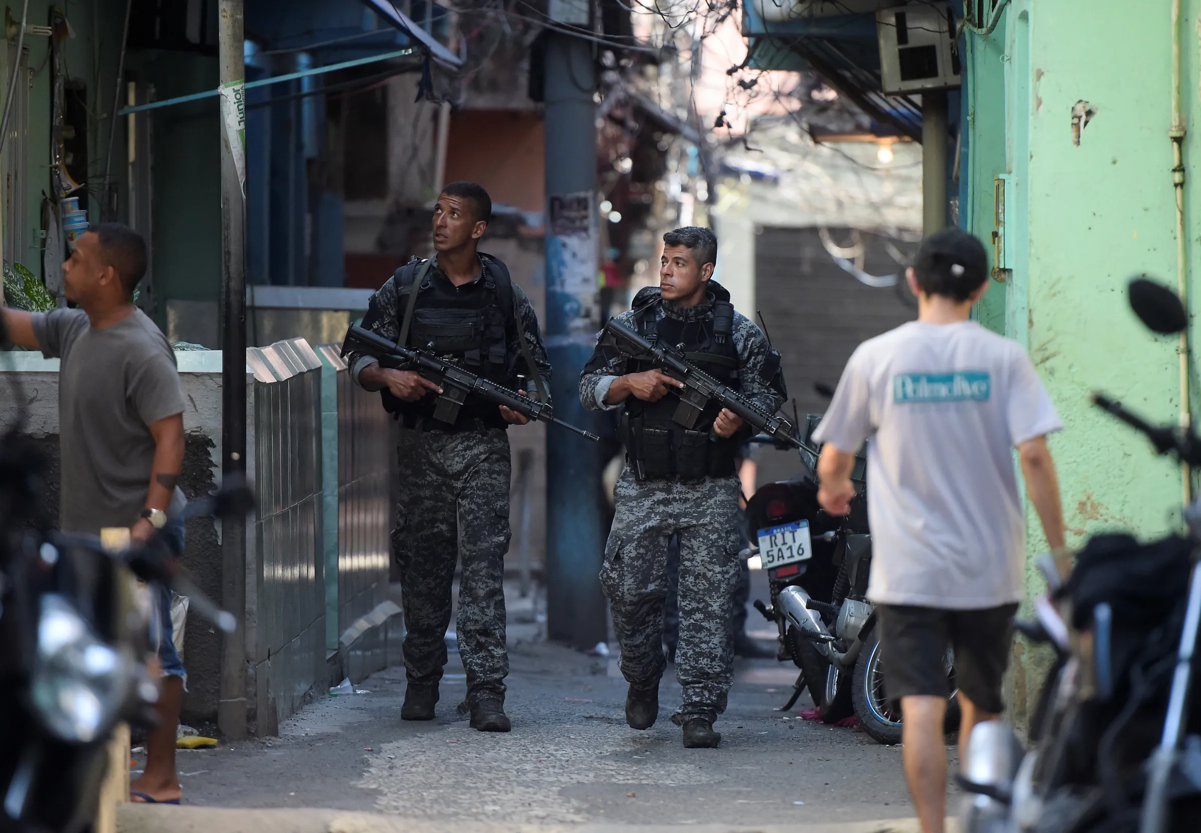 Police officers patrol the Jacarezinho slum during a new pacification operation to combat crime in Rio de Janeiro, Brazil, January 19, 2022. REUTERS/Alexandre Loureiro