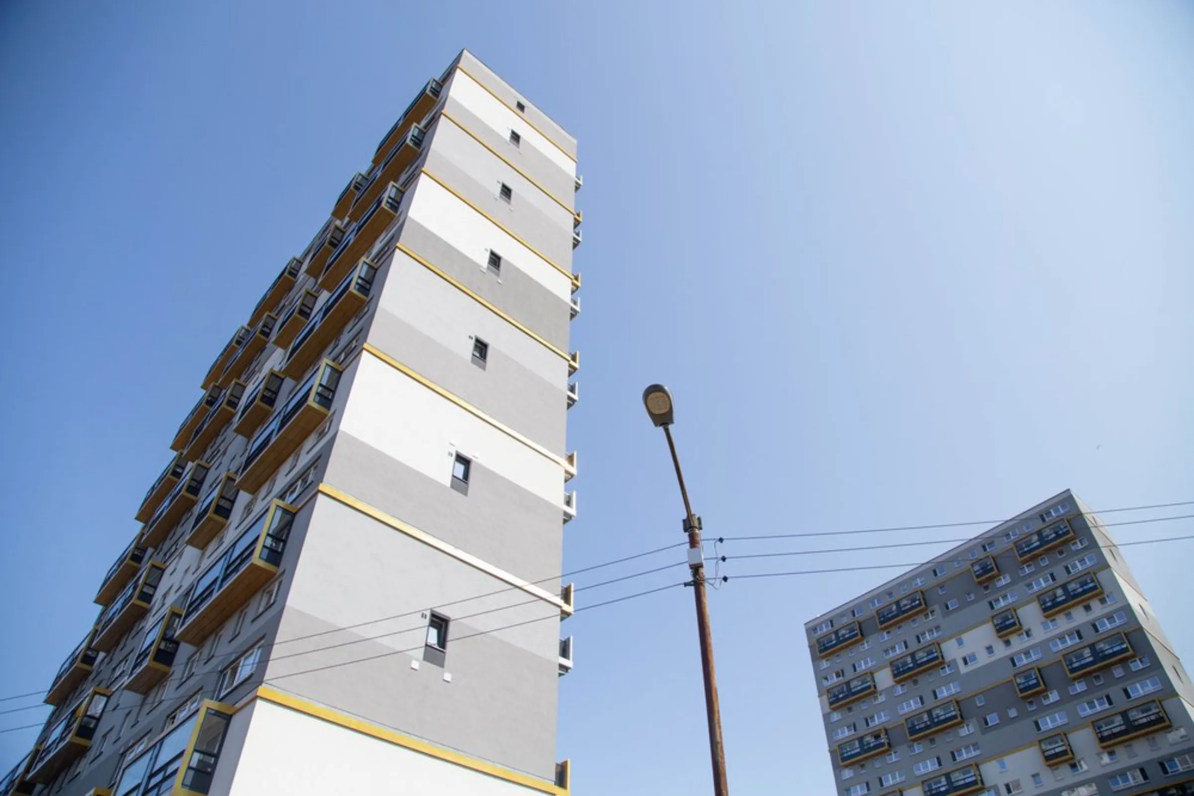 A view of refurbished social housing blocks owned by the Queens Cross Housing Association, in Glasgow, United Kingdom, July 23, 2021