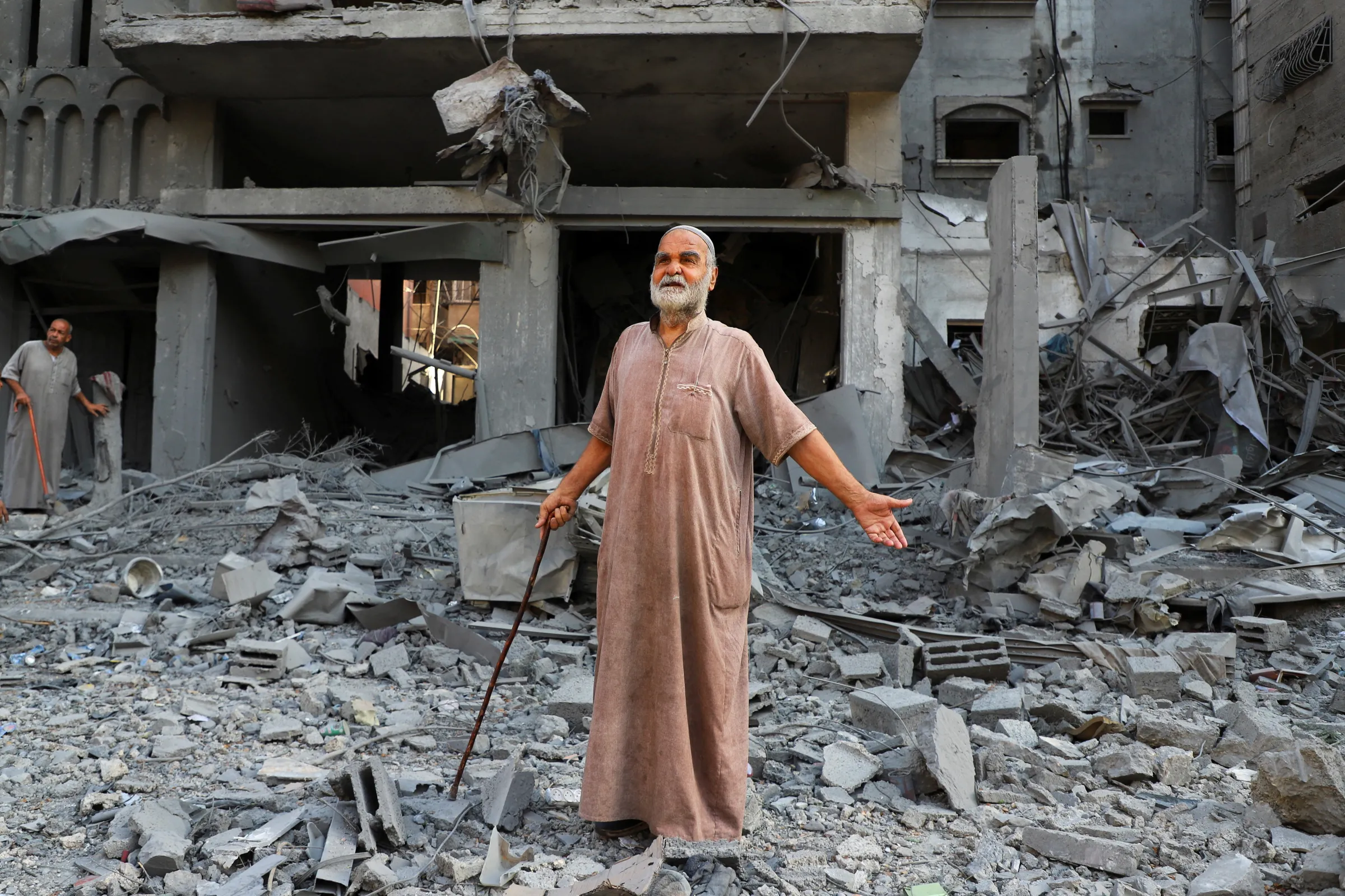 A Palestinian reacts as he inspects the site of Israeli strikes on houses at Shati (Beach) refugee camp, amid an Israeli military operation, in Gaza City, September 26, 2025. REUTERS/Ebrahim Hajjaj