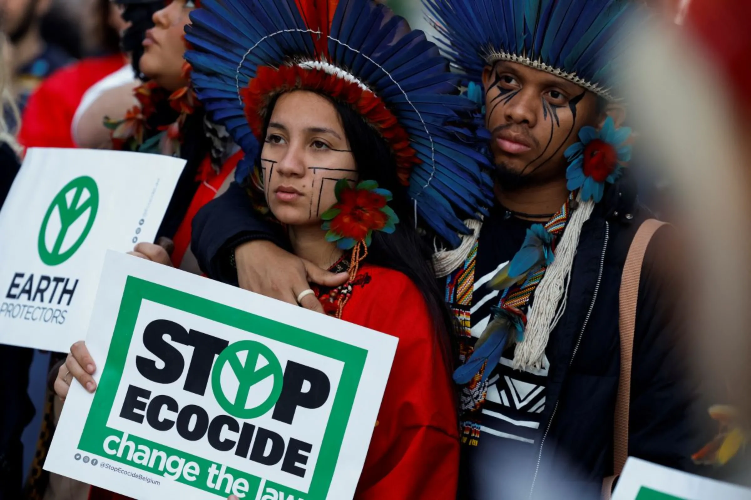 People take part in a protest against climate change called 'EU Council stop Ecocide now. Energy for all' outside European Union leaders summit in Brussels, Belgium October 20, 2022. REUTERS/Piroschka Van De Wouw