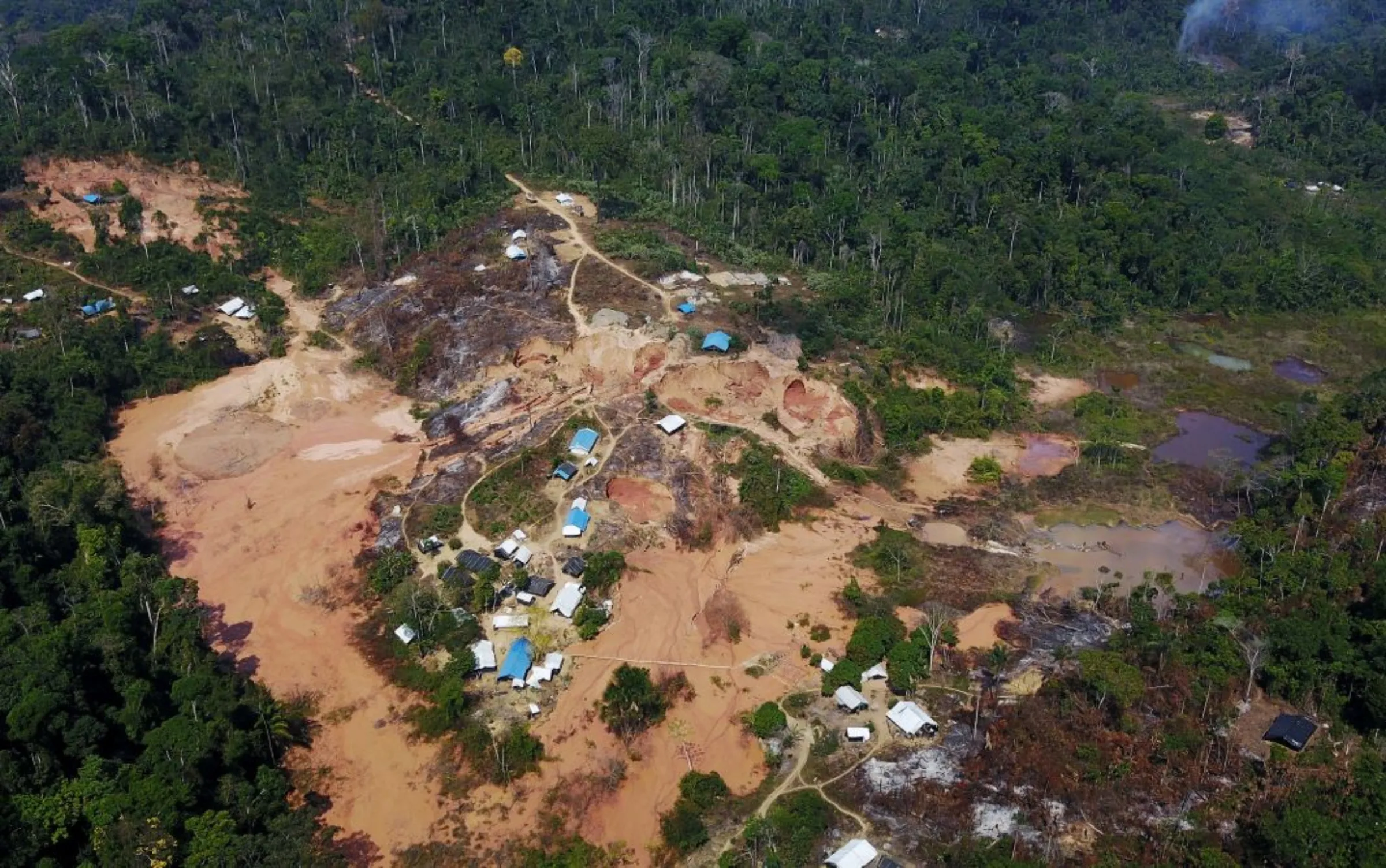An aerial view show a wildcat gold mine, also known as a garimpo, at a deforested area of the Amazon rainforest near Crepurizao, in the municipality of Itaituba, Para State, Brazil, August 6, 2017. Picture taken with a drone