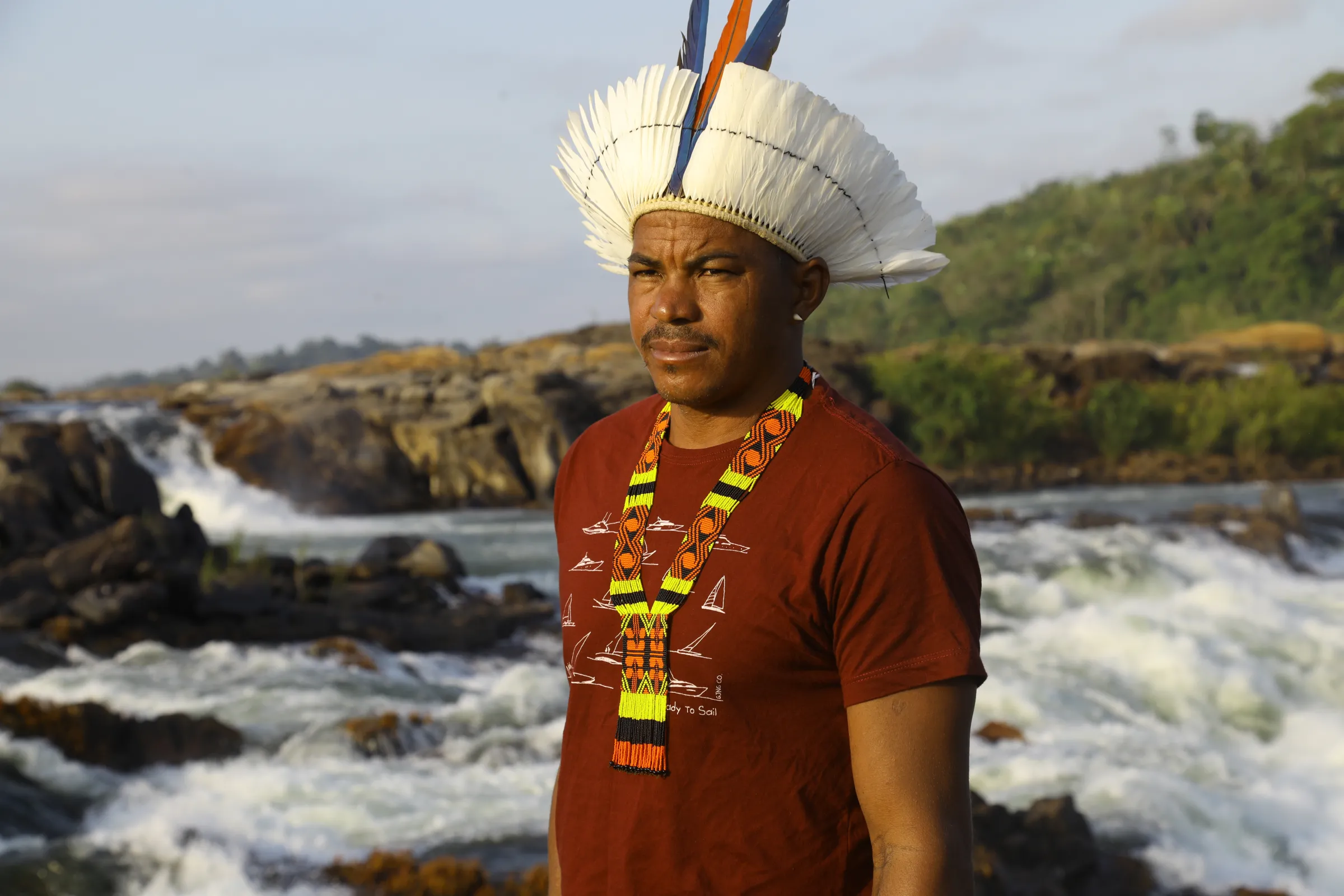 Giliarde Juruna, chief of the indigenous Juruna village of Mîratu, poses for a photograph at Jericoa, a sacred site with a confluence of waterfalls and rapids, on the Volta Grande in the River Xingu, Pará, Brazil, September 16, 2022. Thomson Reuters Foundation/Dan Collyns