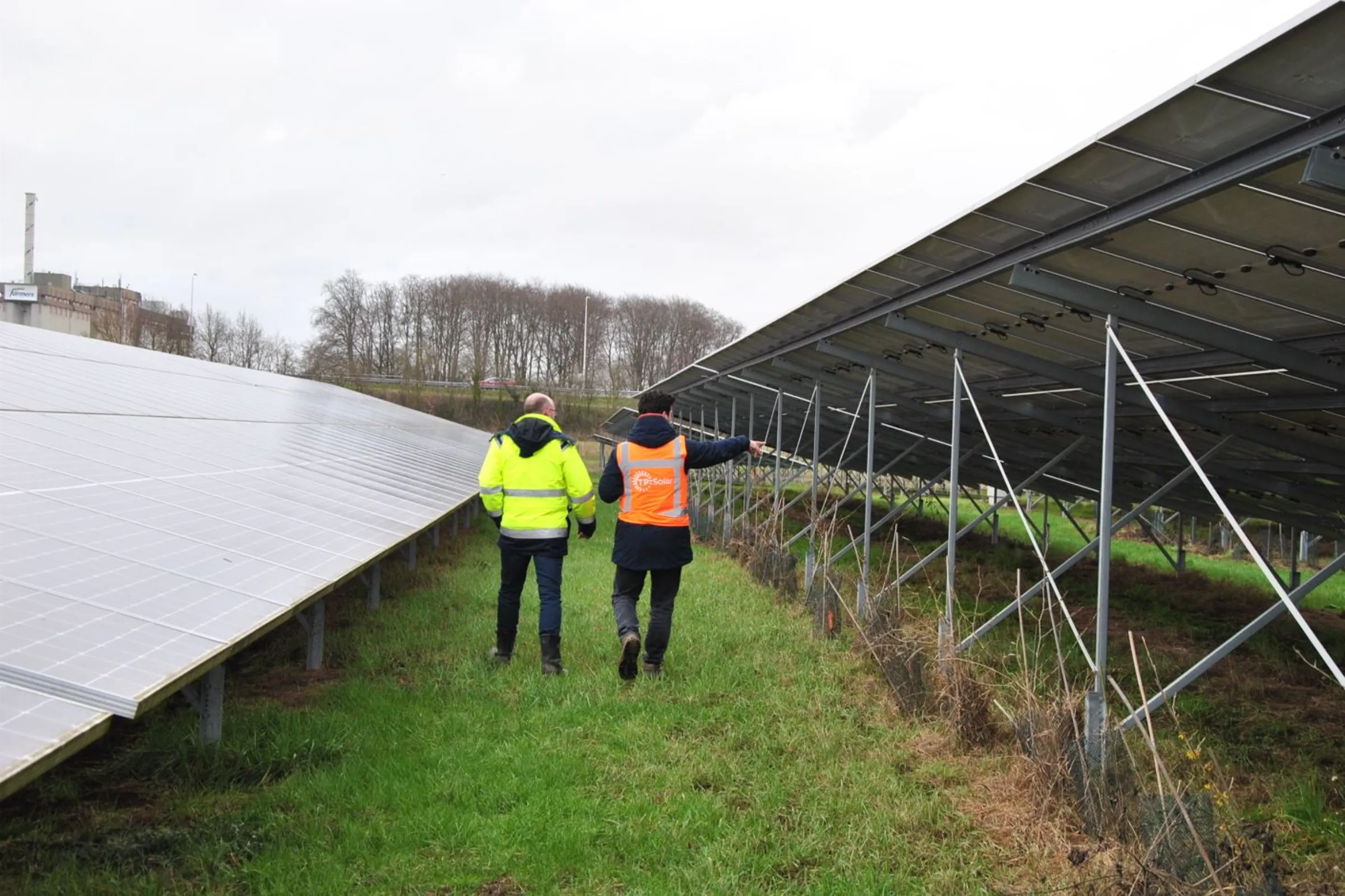 TPSolar's Barry Lamers (left) and Robert van der Horst (right) at solar park Berkelweide in Lochem, the Netherlands, January 30, 2023. Thomson Reuters Foundation/Karolin Schaps