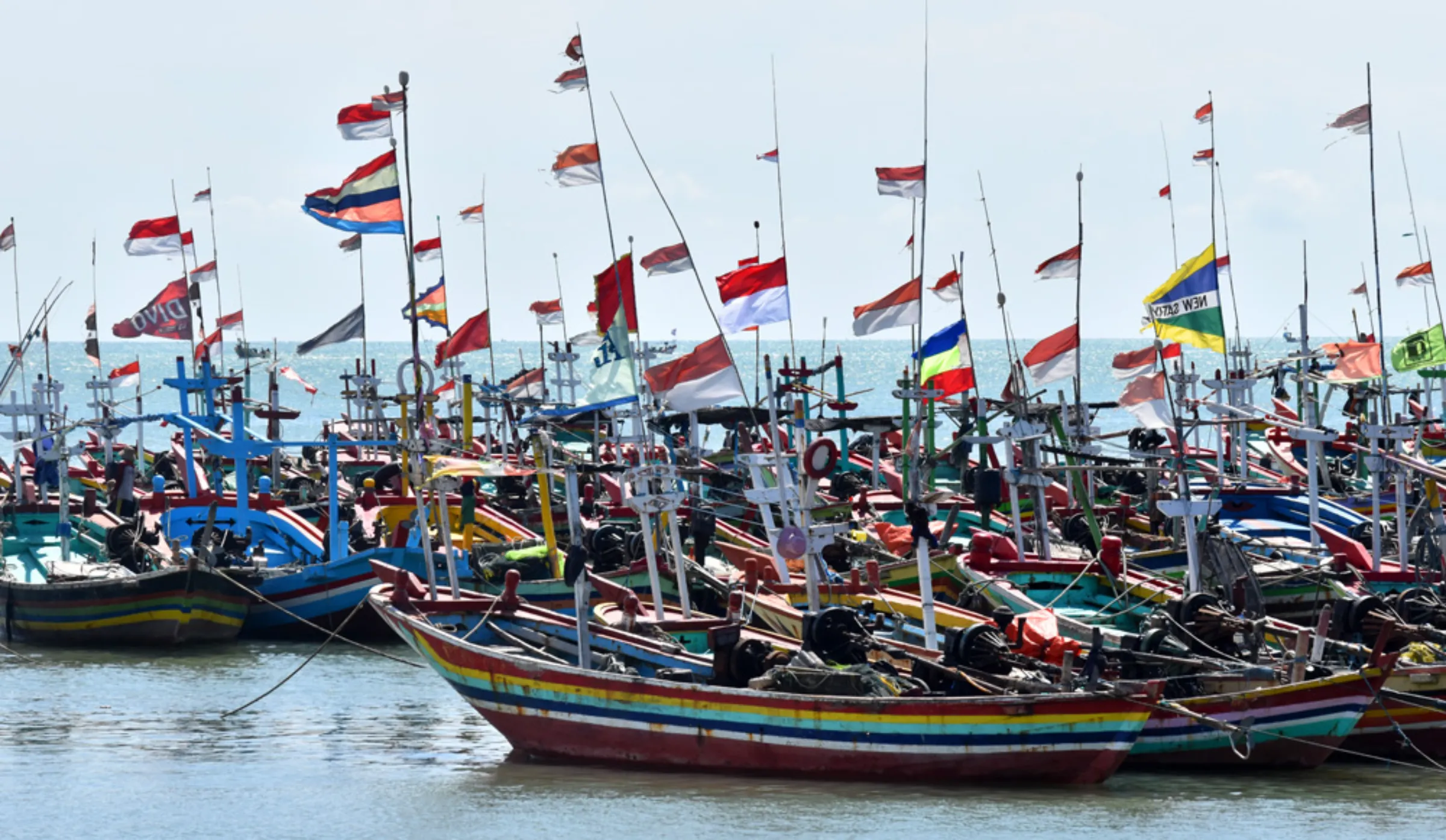 Rows of fishing boats are docked at the port of Tanjung Bonang, in Rembang regency, Indonesia, August 12, 2022